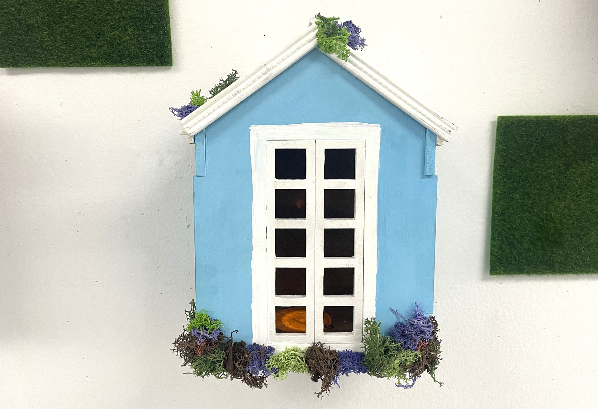 Individual views of the houses, constructed out of laser-cut fiberboard.