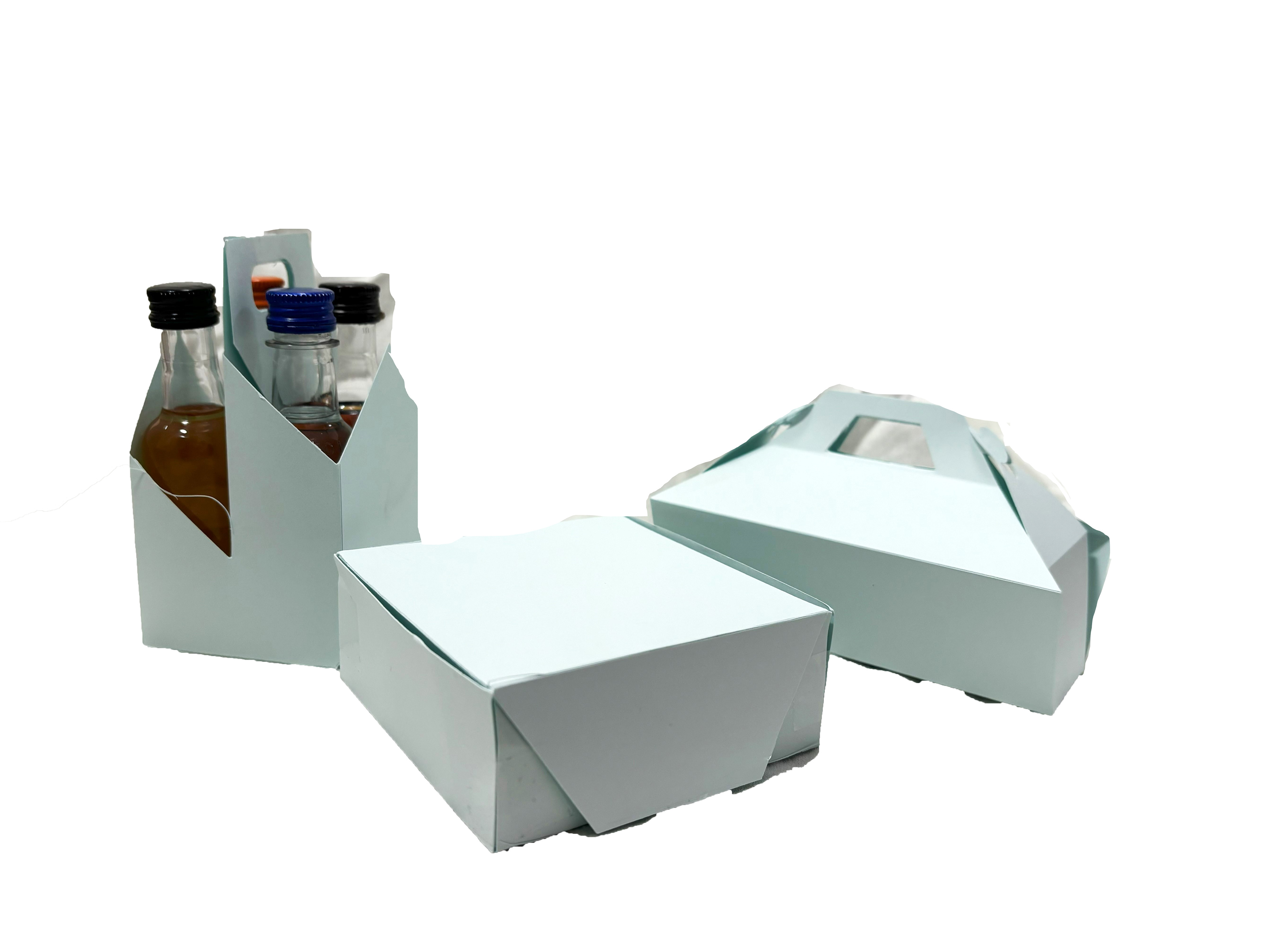 3 paper box prototypes of a gable box, square box, and four pack carrier