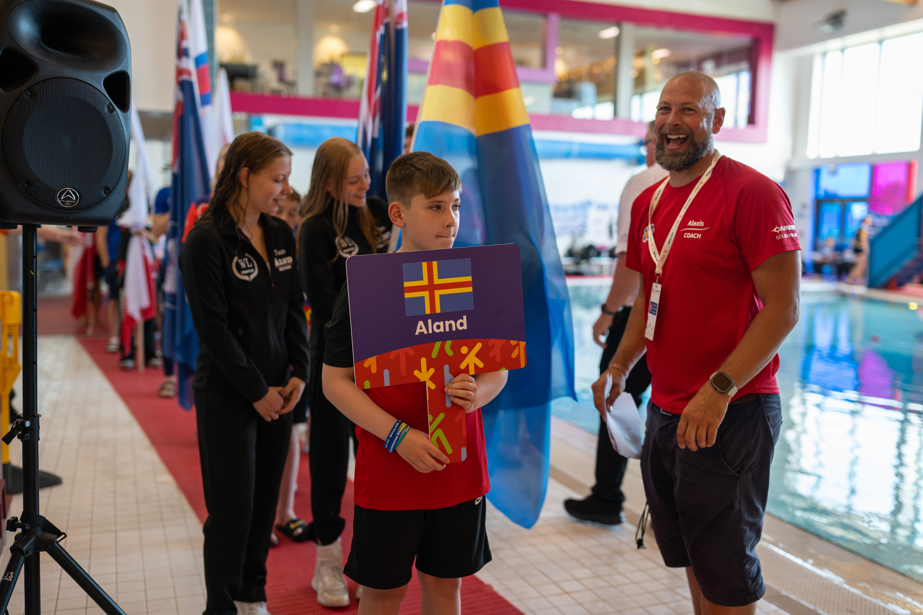 Bespoke branded handheld signs for the swimming presentation ceremony 