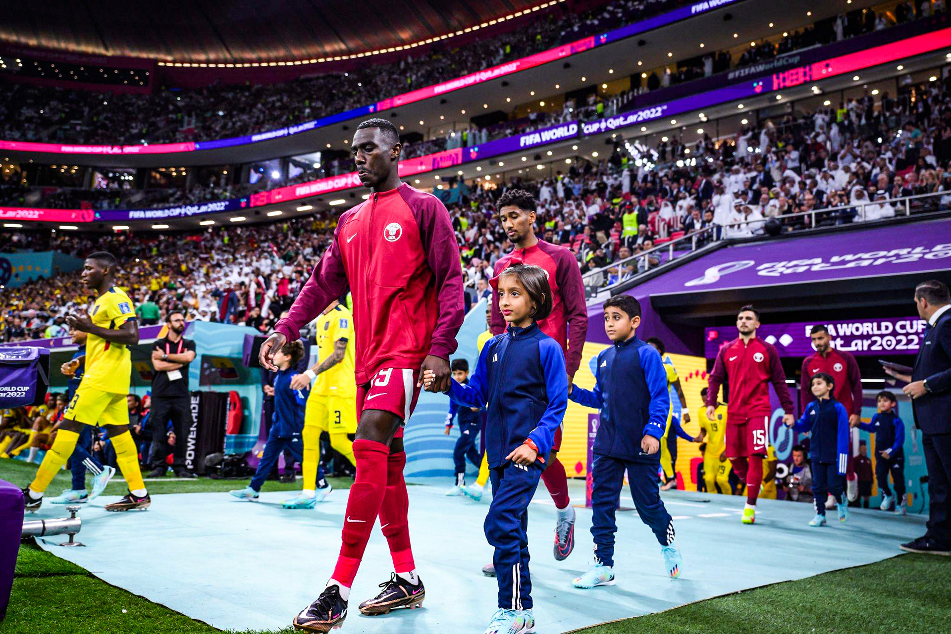 Event branding at Al Bayt Stadium featuring its unique pattern and signature colour scheme as part of FIFA World Cup Qatar 2022 stadium dressing
