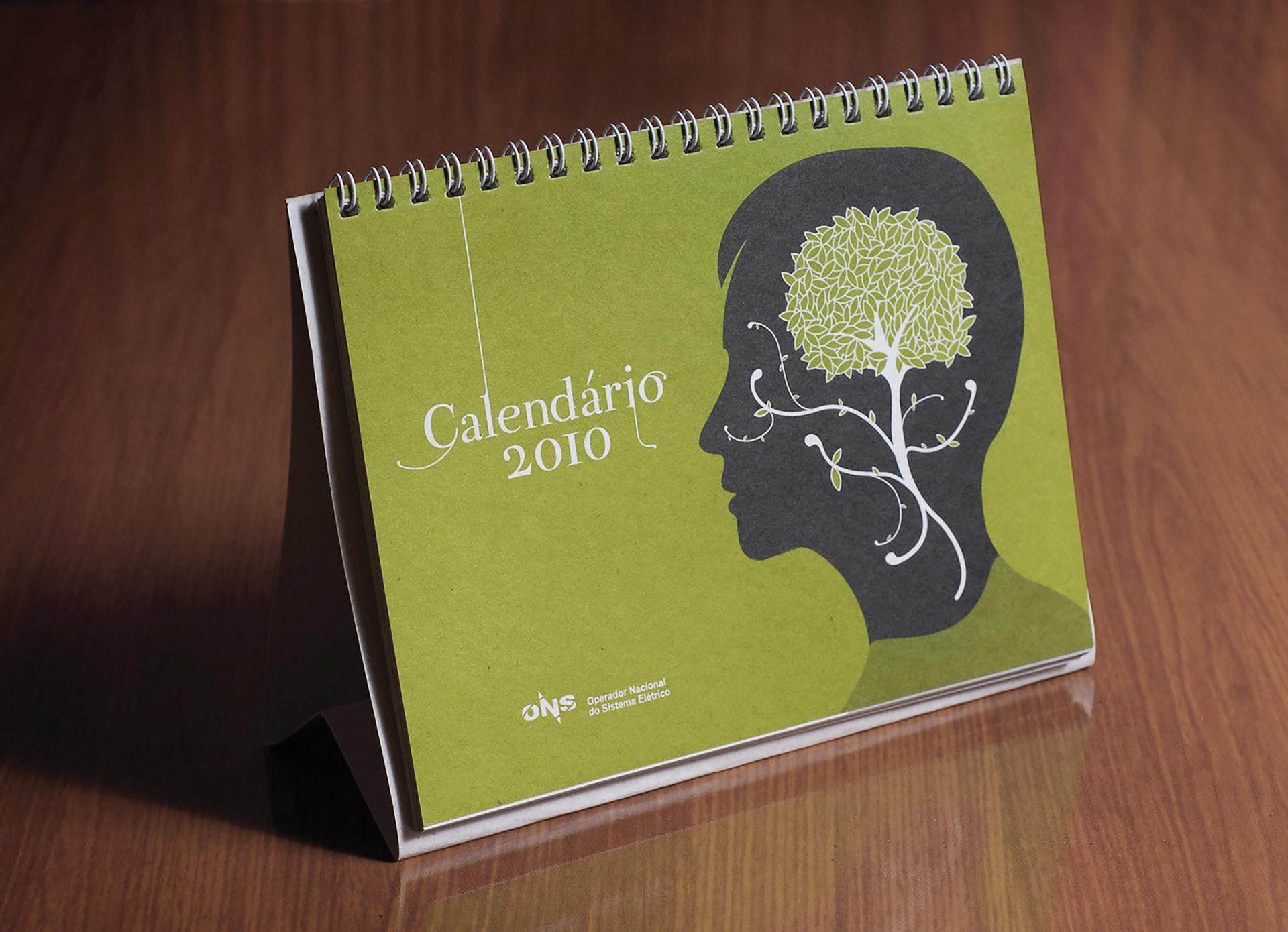 Sustainable calendar and notebook designs featuring eco-conscious illustrations for Brazilian Energy Grid Operator ONS.