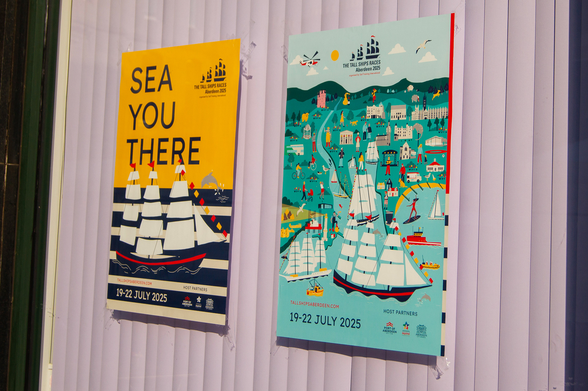 Tall Ships Aberdeen 2025 kit of parts showing repeatable event branding elements such as flags, banners, posters, fence scrims, and bunting.