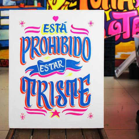 Colourful street market stall in Brazil, reference for Feijoada Art & Design palettes, textures and typographic signage