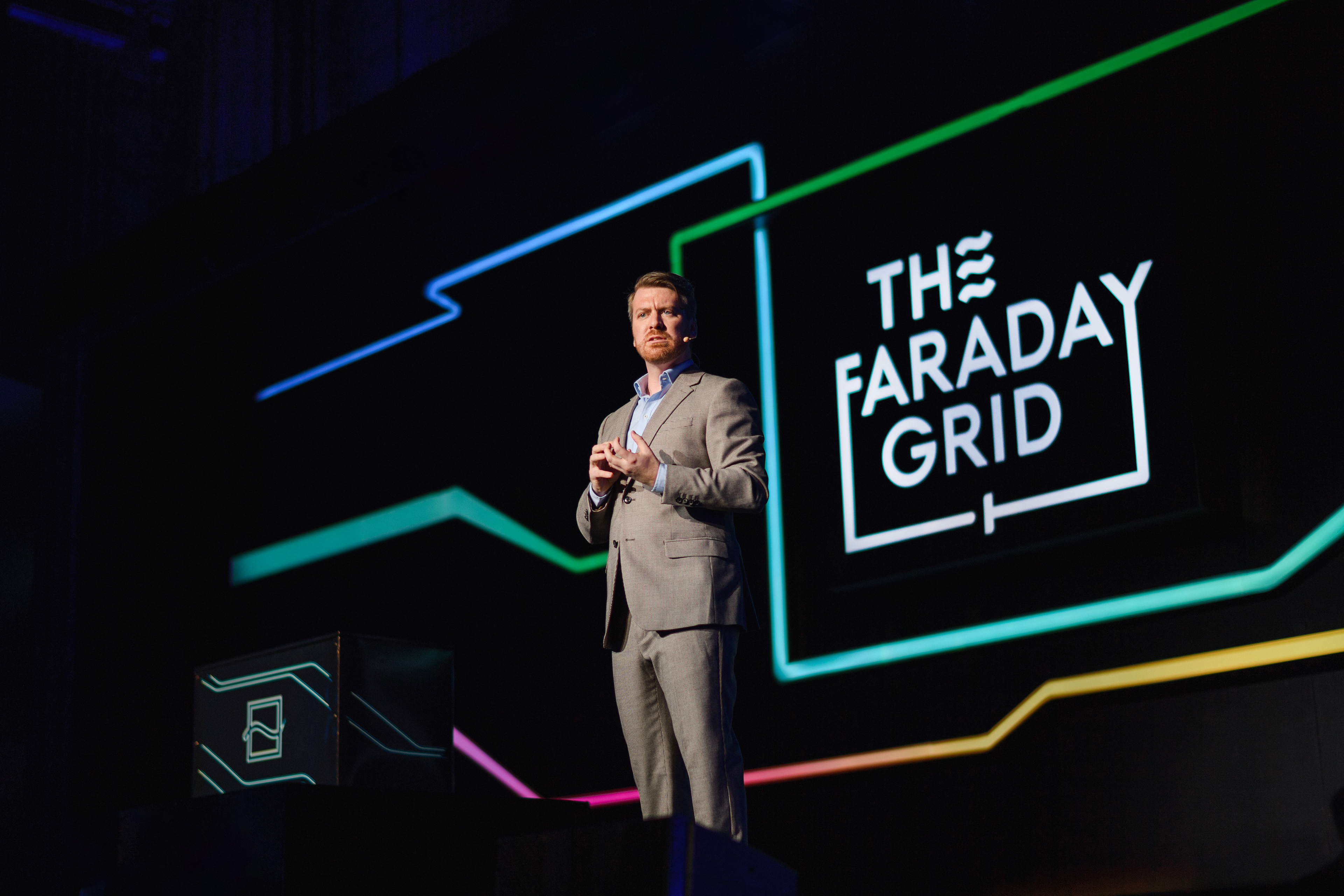 Full brand activation featuring the brand identity implemented in stage design and corporate event look & feel at the Faraday Grid U.S.Launch event in Washington D.C. in 2019