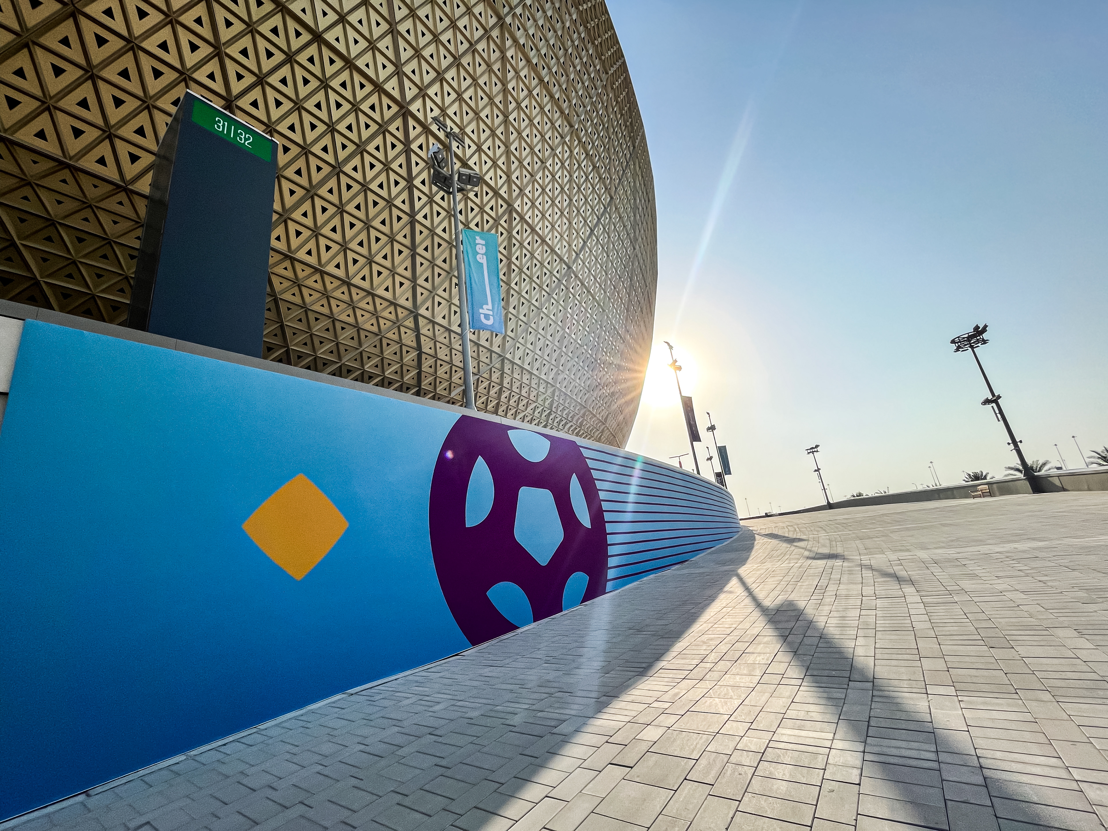 FIFA World Cup Qatar 2022 visuals at Lusail Stadium, highlighting its golden pattern and vibrant signature colours in the event dressing execution