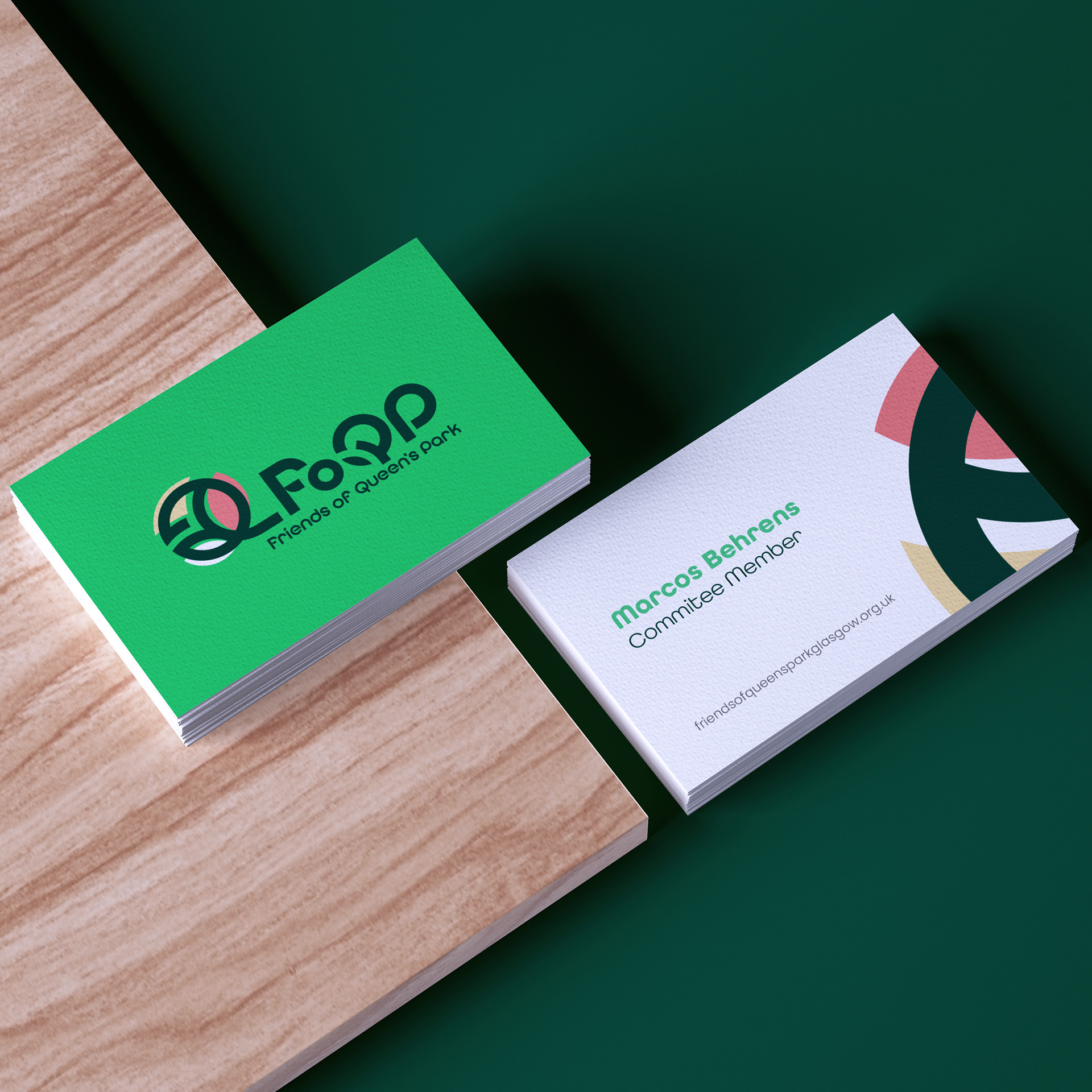 Friends of Queen’s Park logo applied to branded stationery, print materials, and collateral for community and volunteer use.