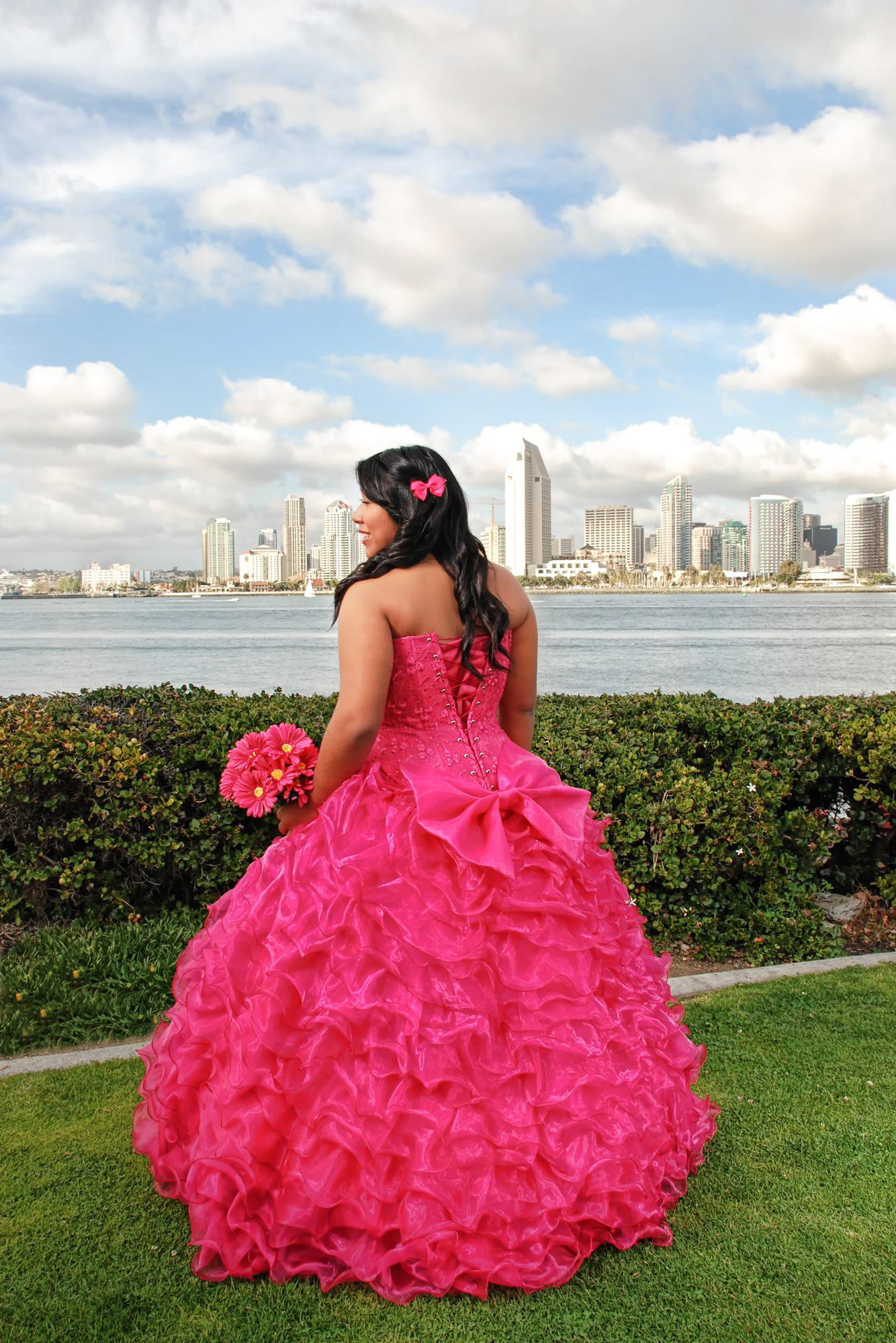 Quinceanera Photo Shoot at Coronado Ferry Landing, overviewing San Diego city by Paloma Jacobo Photography.