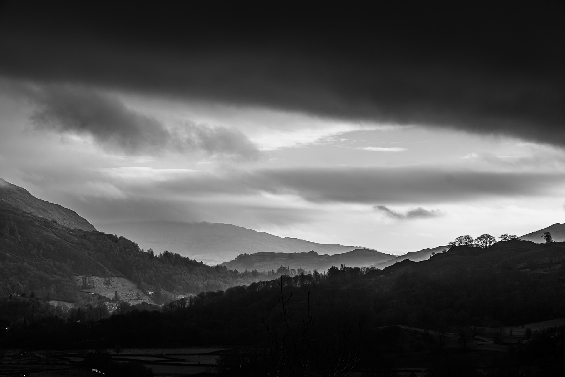 Dark storm clouds rolling over the Grasmere Valley.
