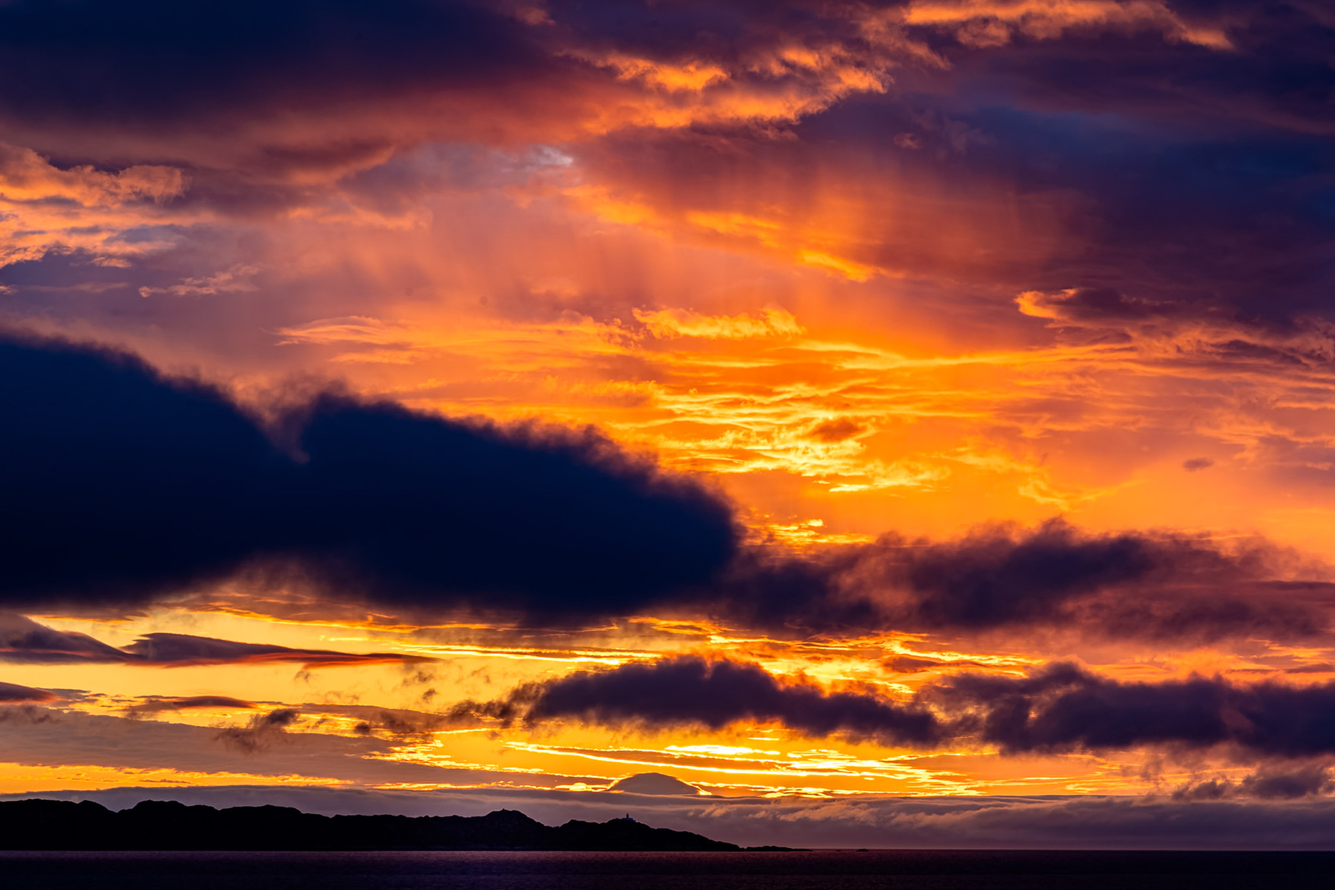 Intense red sunset over the Ronaigh, Northwest Scotland.