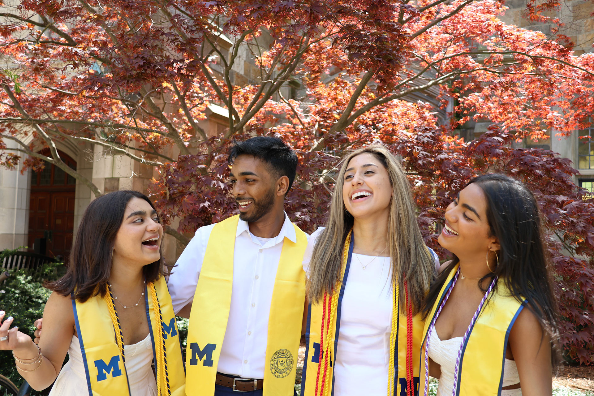 Loved the group candid vibes here, couldve done lower aperture to get more of a blur, the background feels just a bit too distracting from the subjects