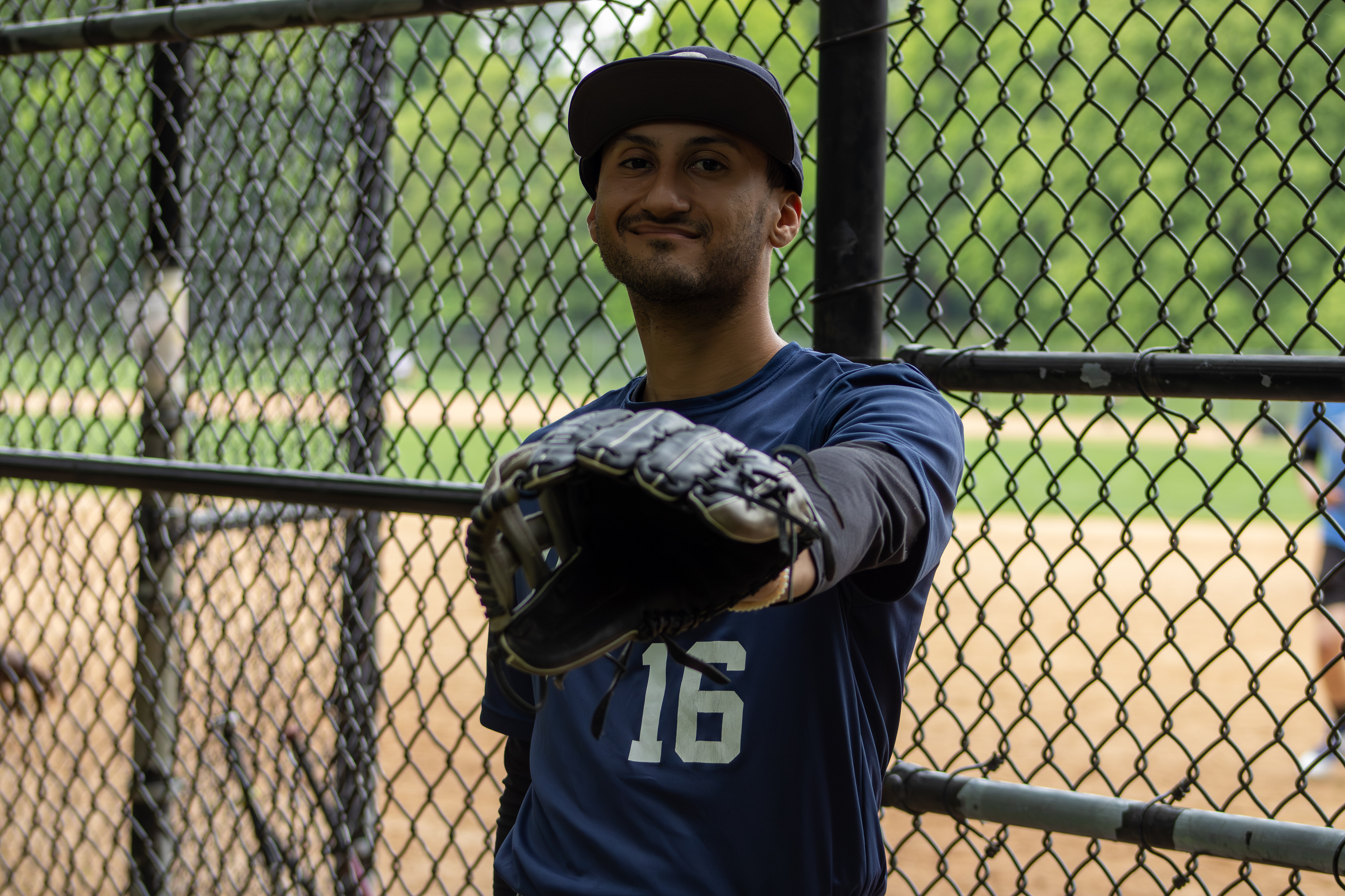 Eric Pascale, 25, plays for the Brooklyn Dukes of the Pancho Coimbre Baseball League posing with his mitt on May 9, 2026.