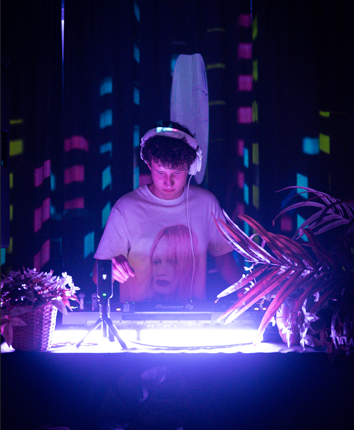 Caption: DJ Misha adjusts the audio levels on his Pioneer controller during a set at Bar Dem in Toronto on Thursday, Jan. 29, 2026. He played a high-energy mix that kept the crowd entertained throughout the fun night out. Camera Settings: 1/60, ISO 6400, f/2.8