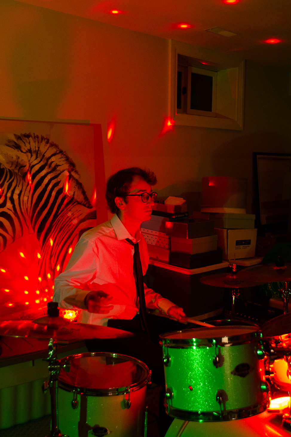 Caption: Andy Wright, lead drummer and songwriter for the Toronto band People Less Qualified, plays his drum kit while practicing for an upcoming EP in Toronto on Saturday, Feb. 21, 2026. He played through the newly written songs for the first time since experiencing a personal breakup. 1/30, ISO 1600, f/4.0