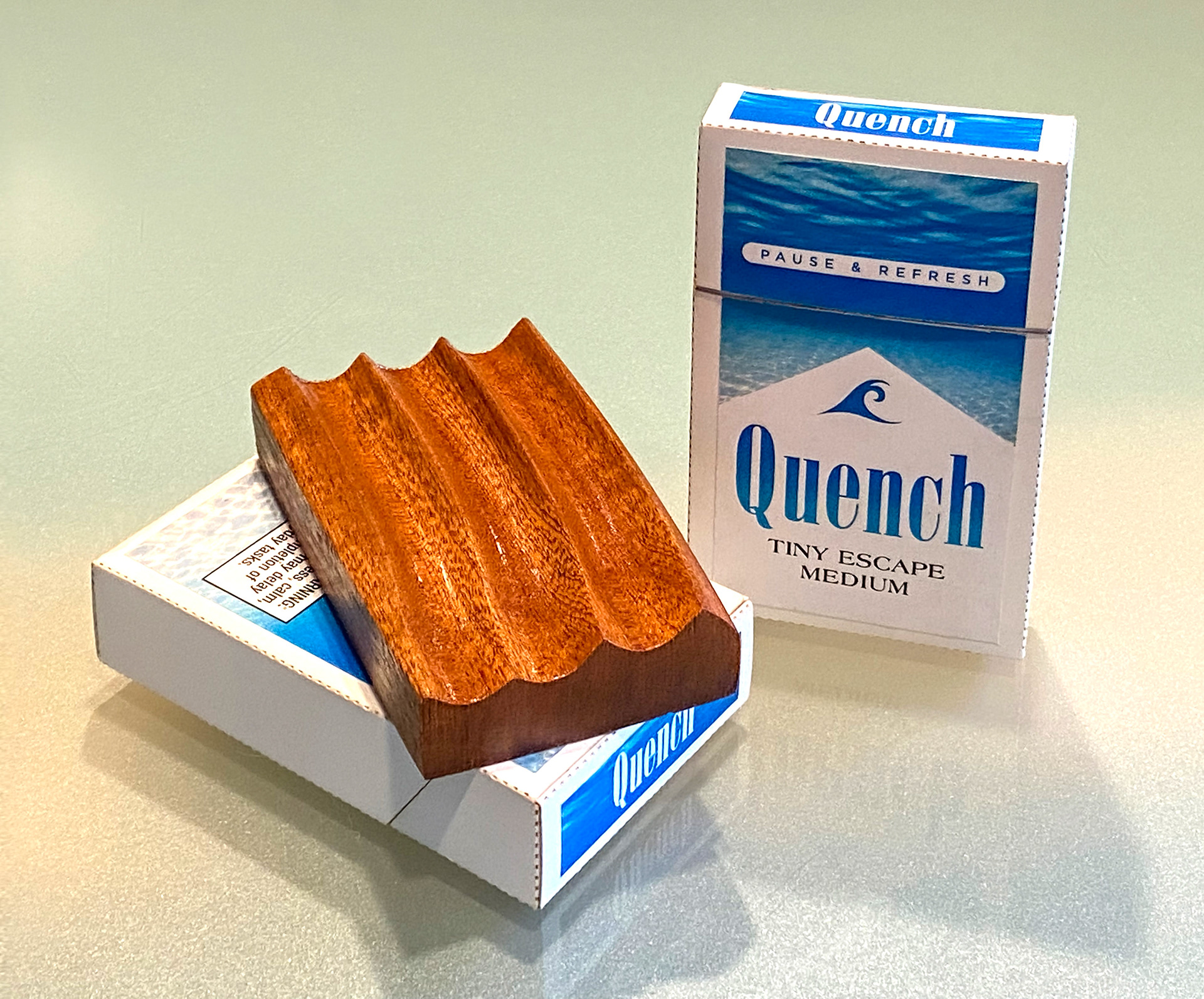 Quench  (SOLD) (2021, carved wood and printed paper box)