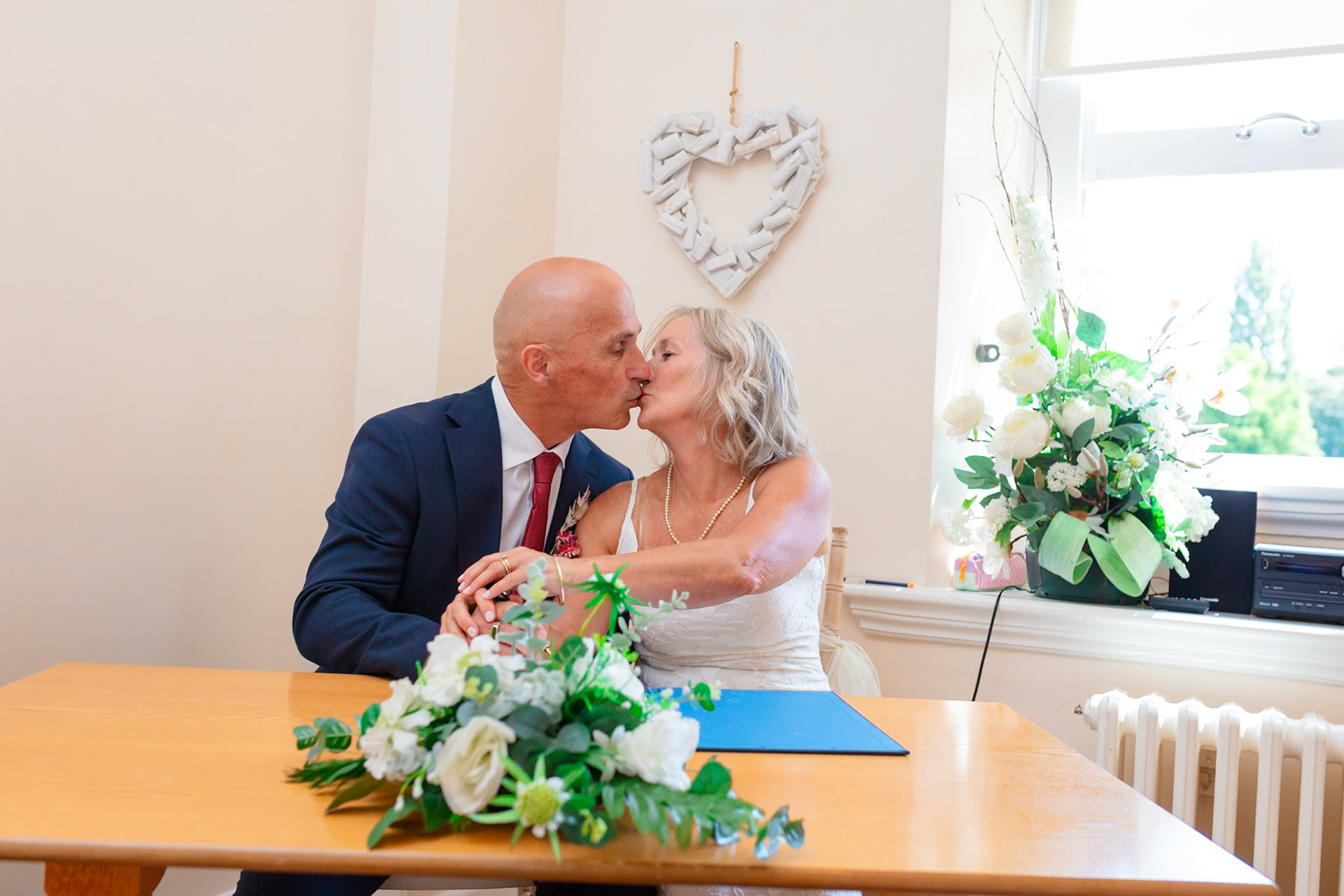 Susan and Barrys small summer wedding took place at Bournemouth Town Hall, the reception at Sids Slaps in Southbourne and drinks at Sobo Beach.