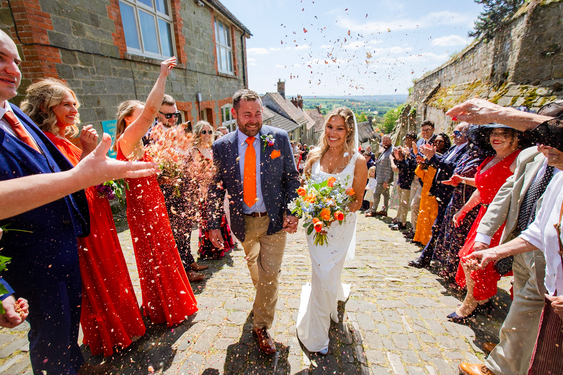 Holly and Olivers wedding that took place on 10th May 2025 with the ceremony taking place at Shaftesbury Town Hall photos on the Famouse Gold Hill and reception at a local house.