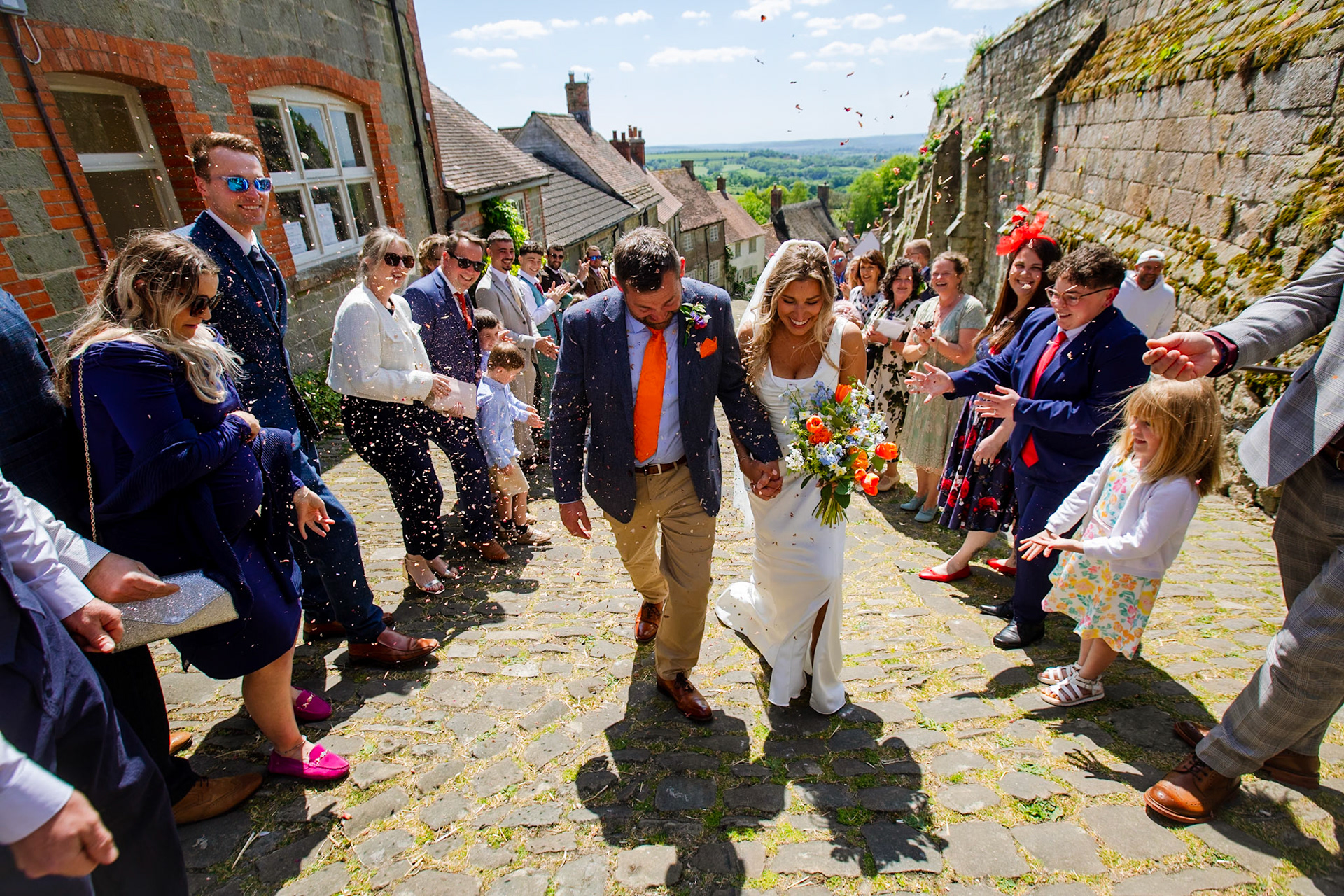 Holly and Olivers wedding that took place on 10th May 2025 with the ceremony taking place at Shaftesbury Town Hall photos on the Famouse Gold Hill and reception at a local house.