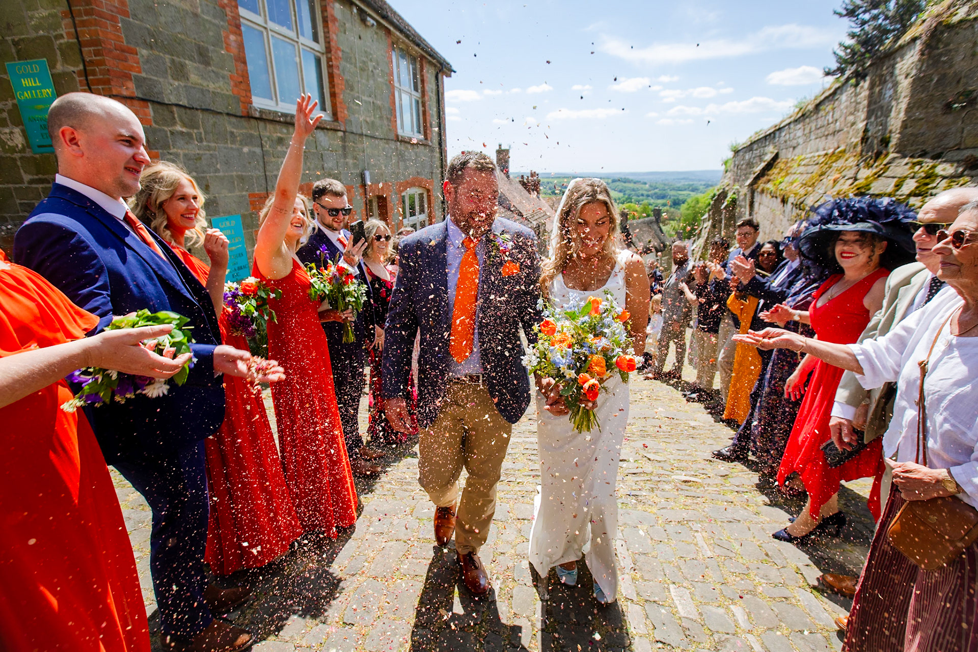 Holly and Olivers wedding that took place on 10th May 2025 with the ceremony taking place at Shaftesbury Town Hall photos on the Famouse Gold Hill and reception at a local house.