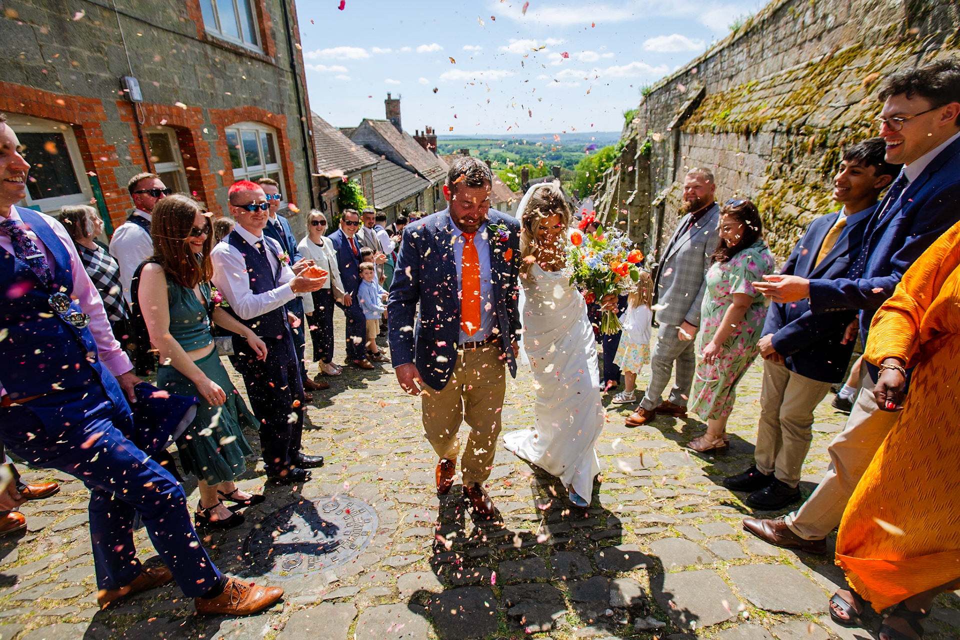 Holly and Olivers wedding that took place on 10th May 2025 with the ceremony taking place at Shaftesbury Town Hall photos on the Famouse Gold Hill and reception at a local house.