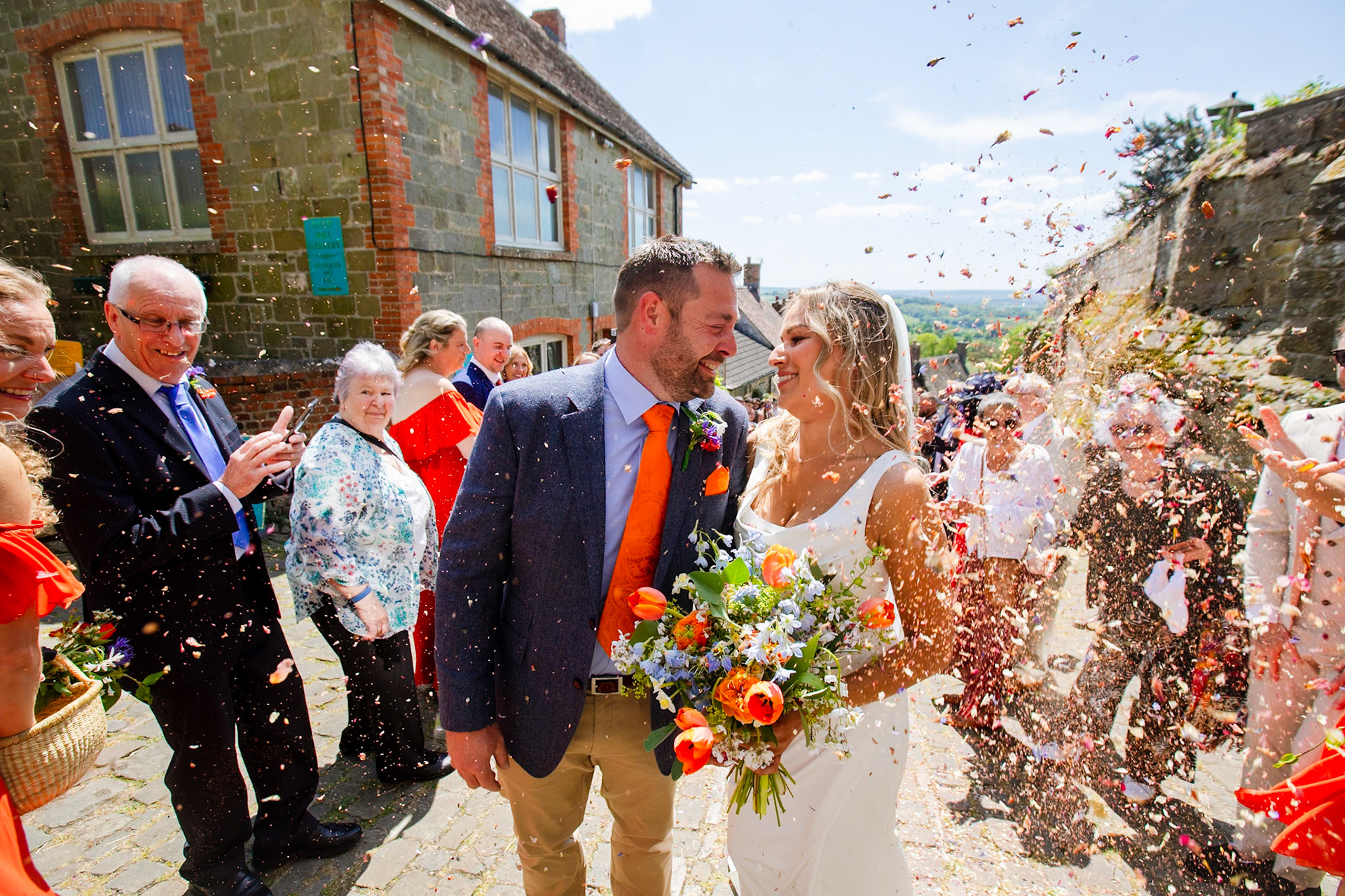 Holly and Olivers wedding that took place on 10th May 2025 with the ceremony taking place at Shaftesbury Town Hall photos on the Famouse Gold Hill and reception at a local house.