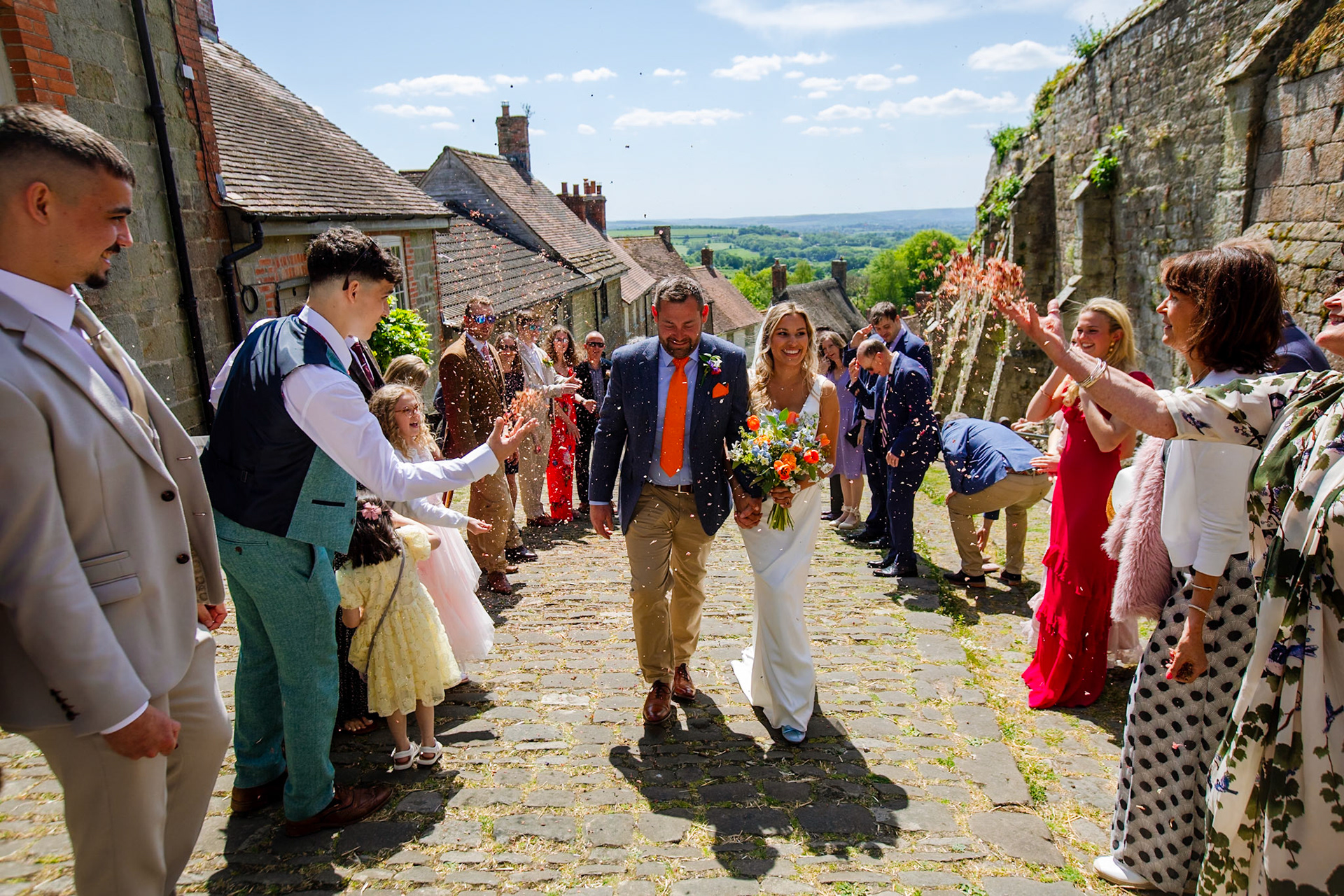 Holly and Olivers wedding that took place on 10th May 2025 with the ceremony taking place at Shaftesbury Town Hall photos on the Famouse Gold Hill and reception at a local house.