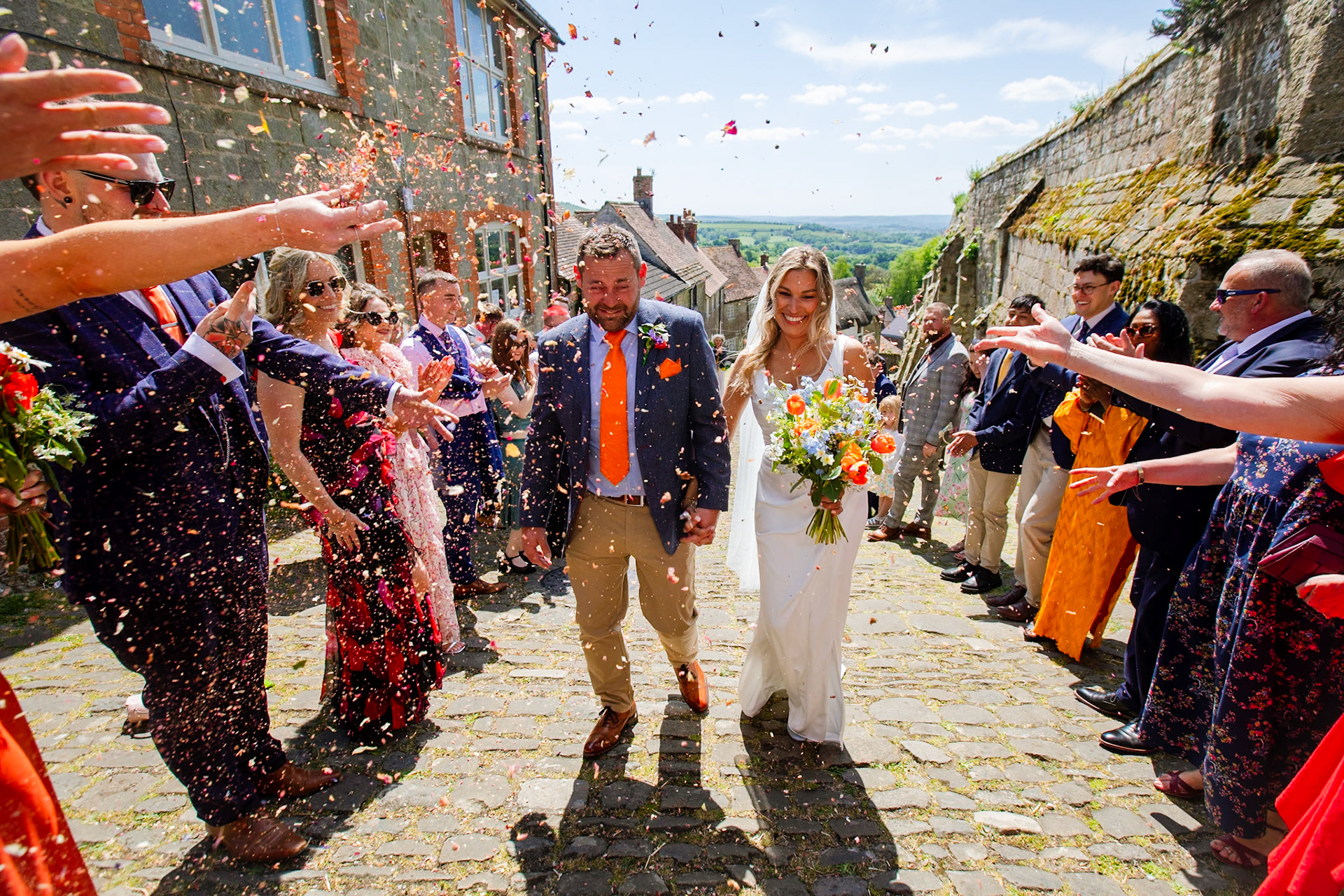 Holly and Olivers wedding that took place on 10th May 2025 with the ceremony taking place at Shaftesbury Town Hall photos on the Famouse Gold Hill and reception at a local house.