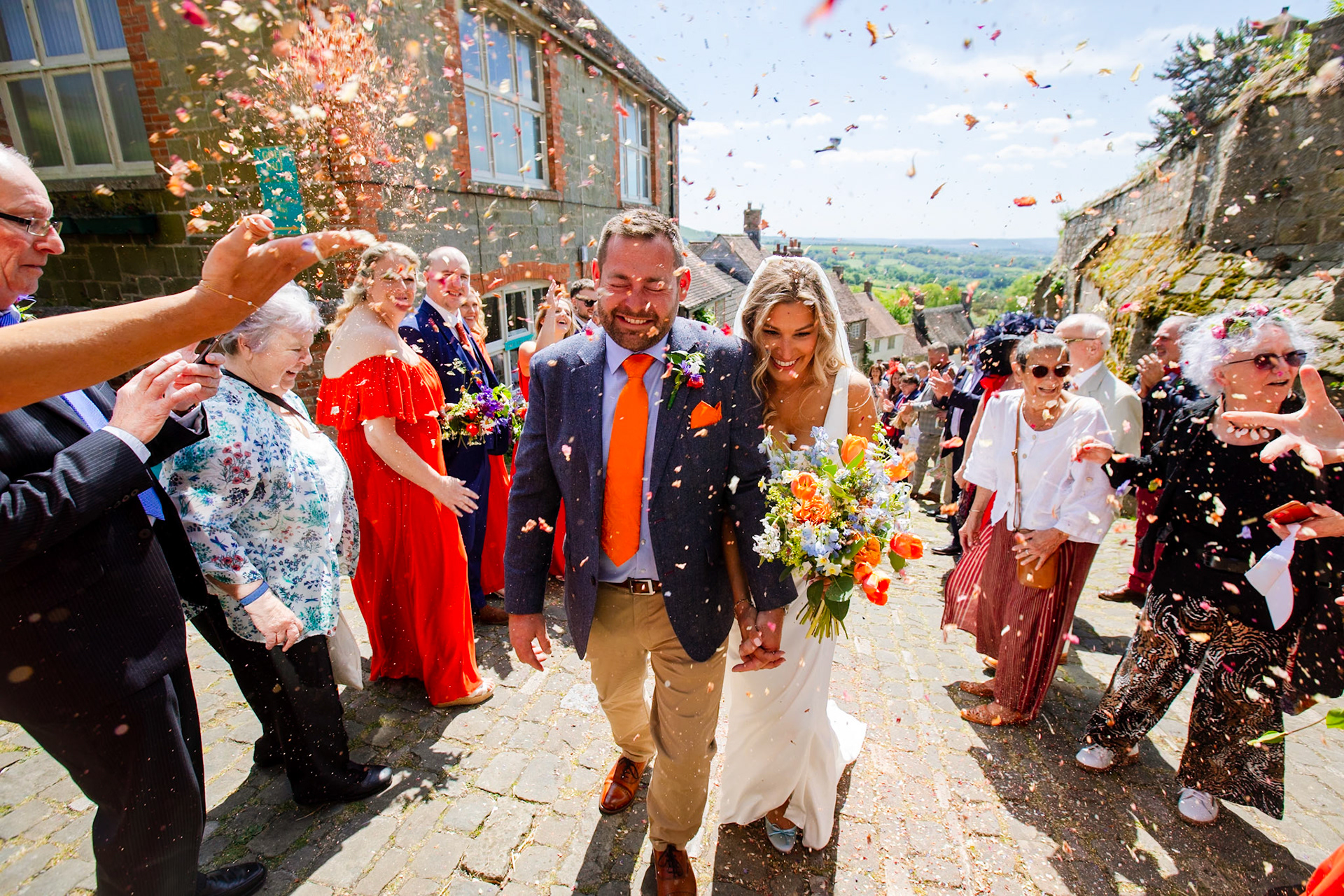 Holly and Olivers wedding that took place on 10th May 2025 with the ceremony taking place at Shaftesbury Town Hall photos on the Famouse Gold Hill and reception at a local house.