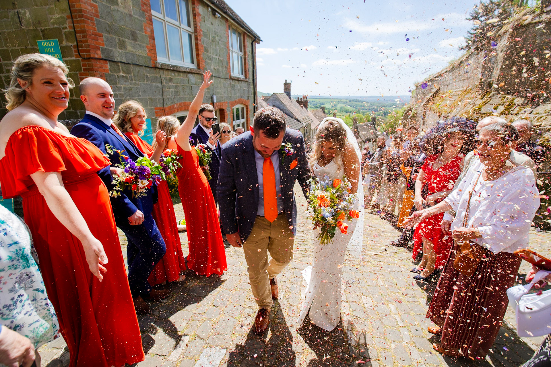 Holly and Olivers wedding that took place on 10th May 2025 with the ceremony taking place at Shaftesbury Town Hall photos on the Famouse Gold Hill and reception at a local house.