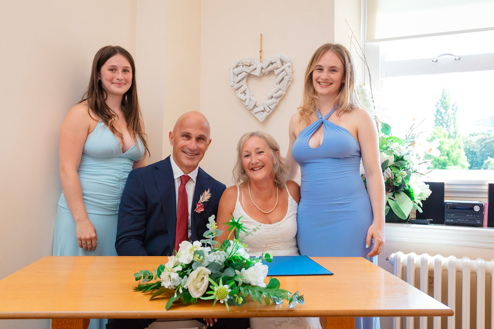 Susan and Barrys small summer wedding took place at Bournemouth Town Hall, the reception at Sids Slaps in Southbourne and drinks at Sobo Beach.