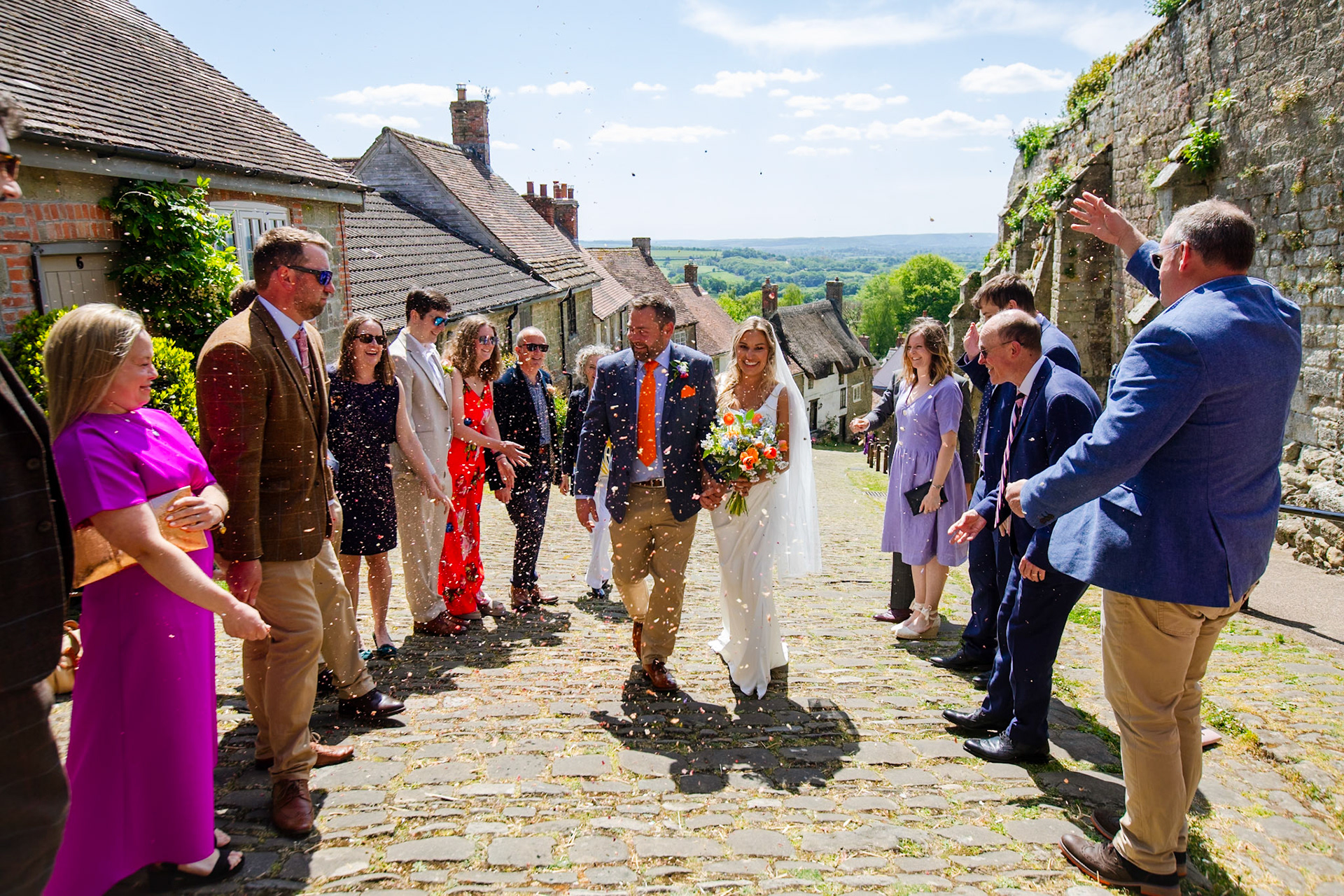 Holly and Olivers wedding that took place on 10th May 2025 with the ceremony taking place at Shaftesbury Town Hall photos on the Famouse Gold Hill and reception at a local house.