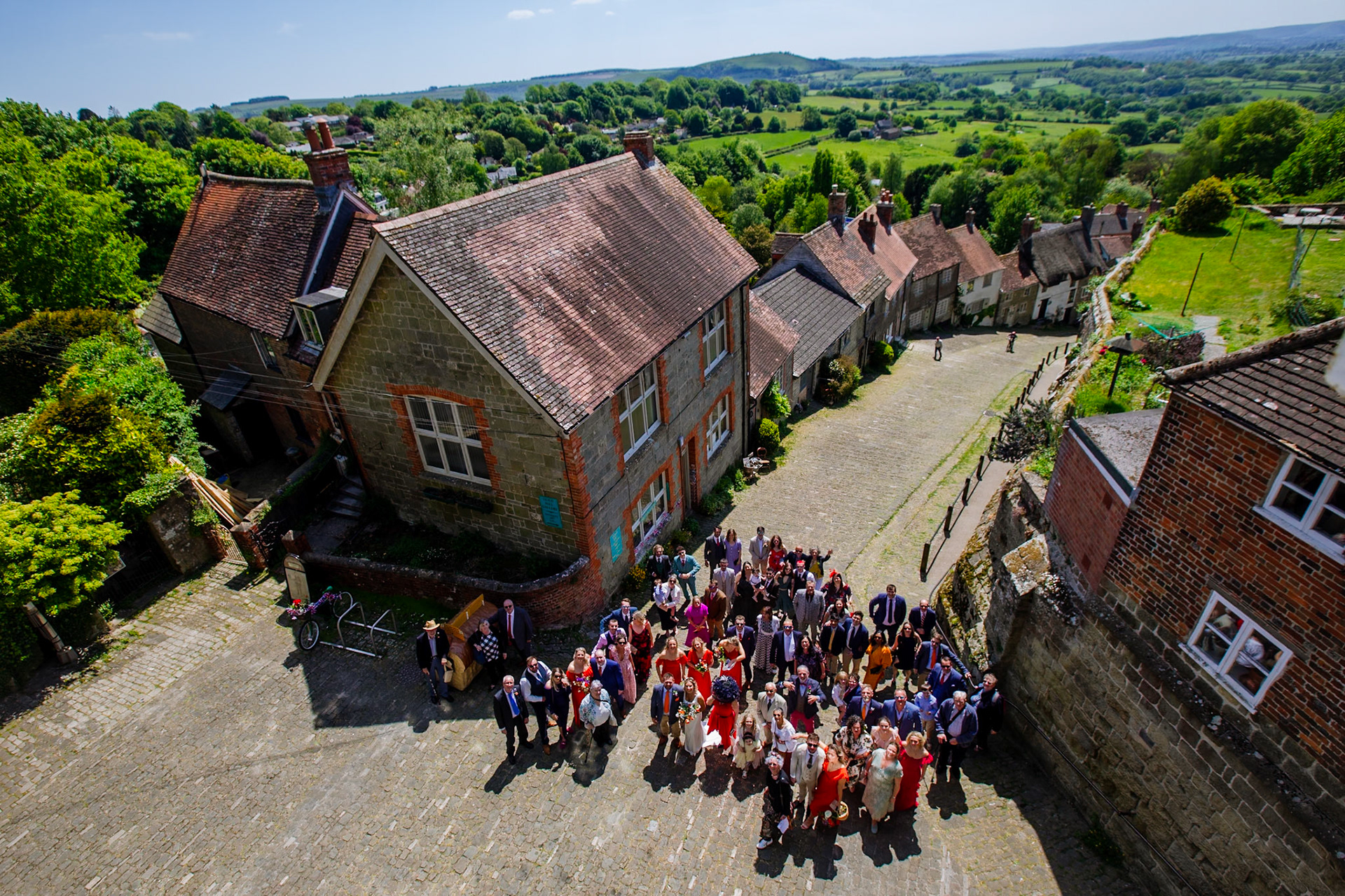 Holly and Olivers wedding that took place on 10th May 2025 with the ceremony taking place at Shaftesbury Town Hall photos on the Famouse Gold Hill and reception at a local house.