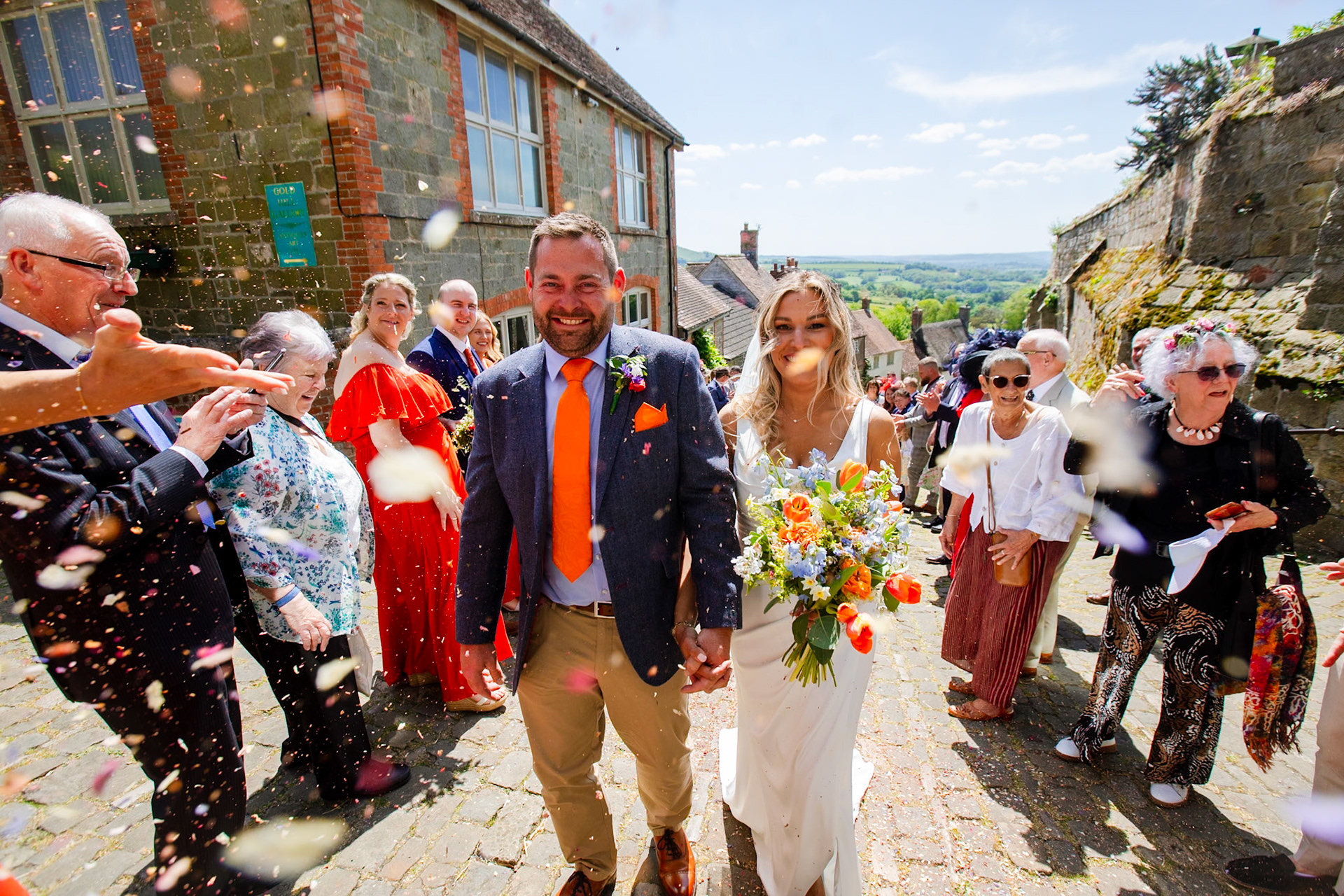 Holly and Olivers wedding that took place on 10th May 2025 with the ceremony taking place at Shaftesbury Town Hall photos on the Famouse Gold Hill and reception at a local house.