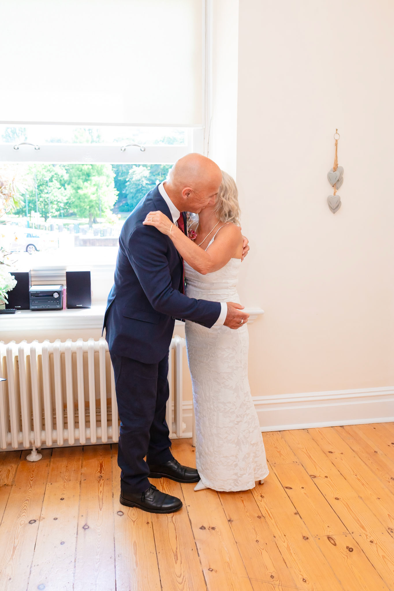 Susan and Barrys small summer wedding took place at Bournemouth Town Hall, the reception at Sids Slaps in Southbourne and drinks at Sobo Beach.