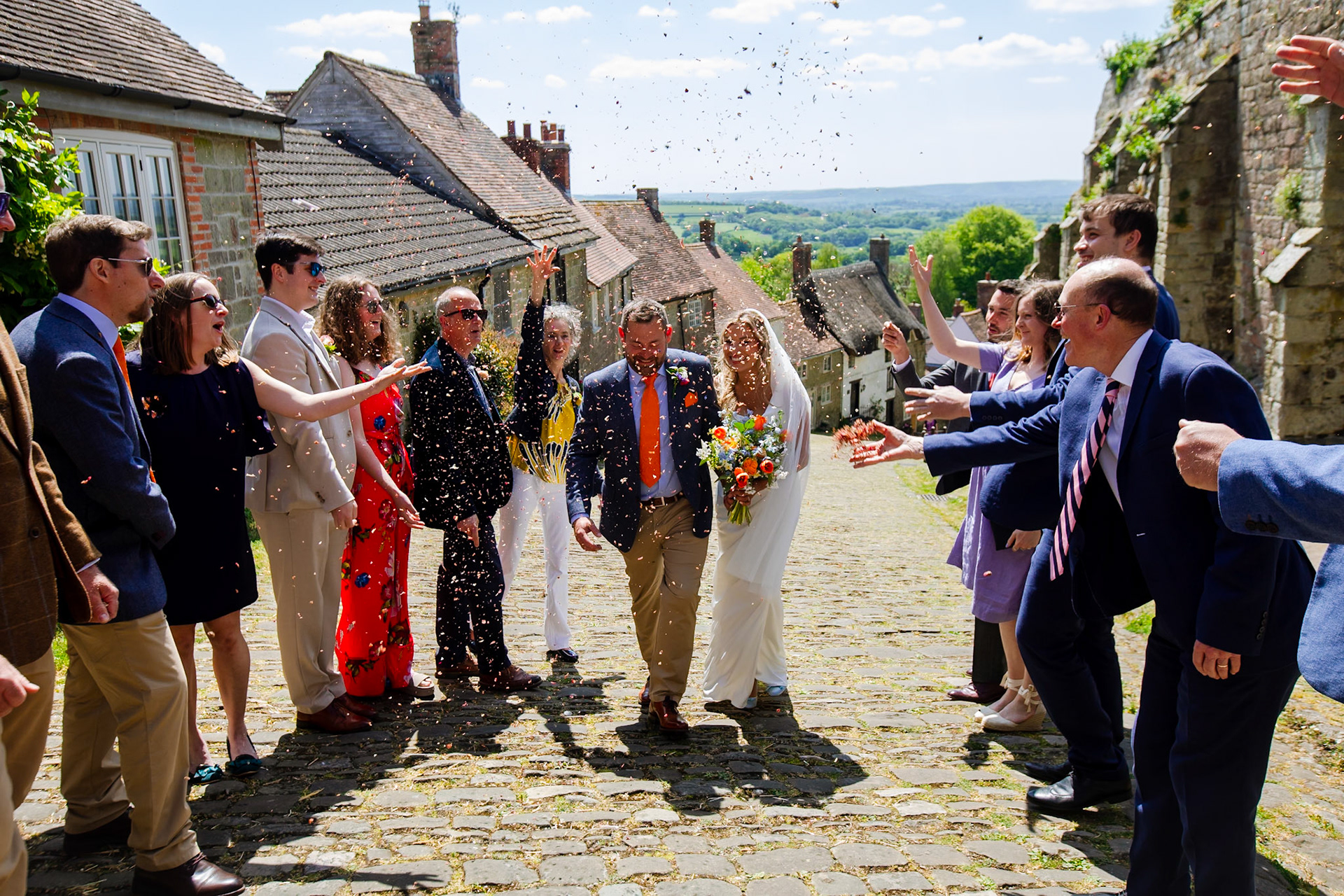 Holly and Olivers wedding that took place on 10th May 2025 with the ceremony taking place at Shaftesbury Town Hall photos on the Famouse Gold Hill and reception at a local house.