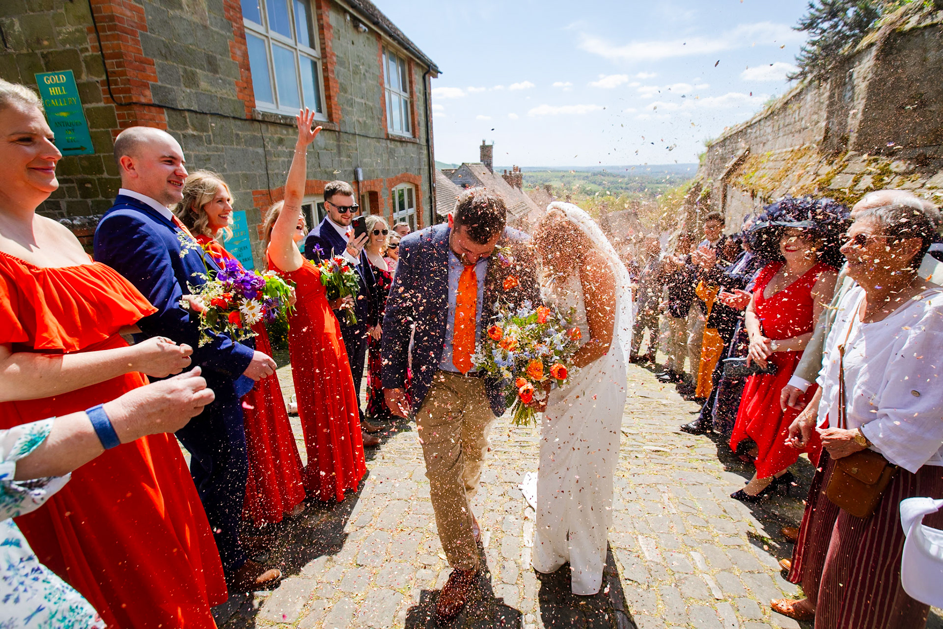Holly and Olivers wedding that took place on 10th May 2025 with the ceremony taking place at Shaftesbury Town Hall photos on the Famouse Gold Hill and reception at a local house.