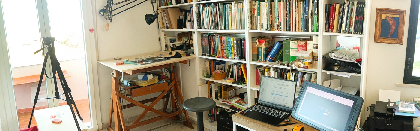 Ardo Quaranta’s design studio with work tables and library — the creative space where Divinissimi Assi was born (CalamoVe).
