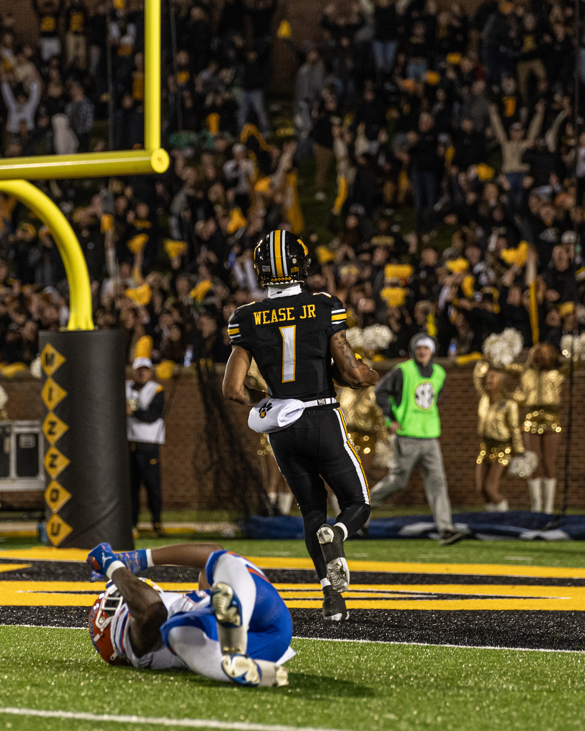 From left, Florida safety Bryce Thornton (18) as Mizzou wide receiver Theo Wease Jr. (1) scores a 77-yard touchdown at Memorial Stadium on Nov. 18, 2023, in Columbia, Mo. 