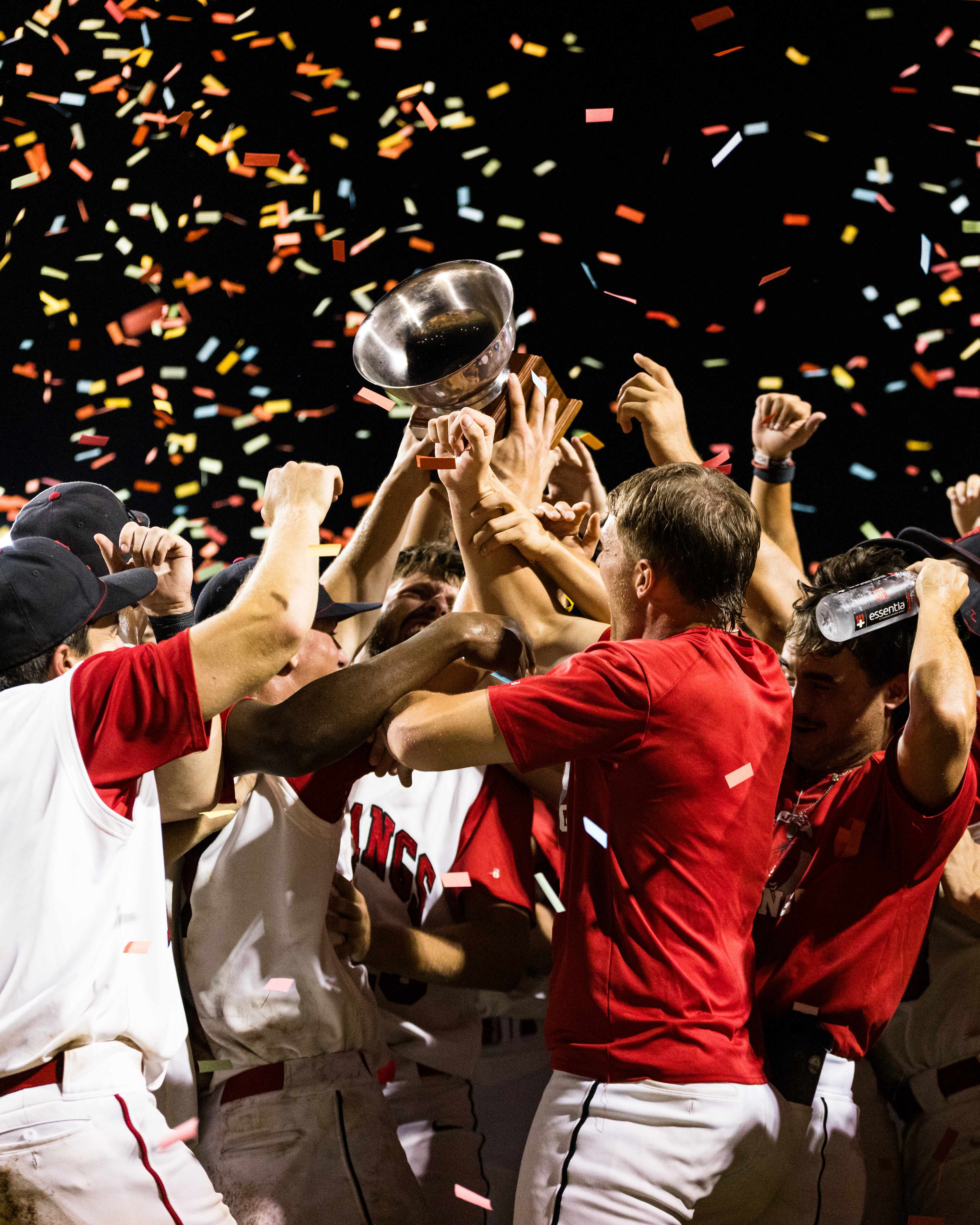 Saint Joseph Mustang players celebrate after winning the MINK League Championship