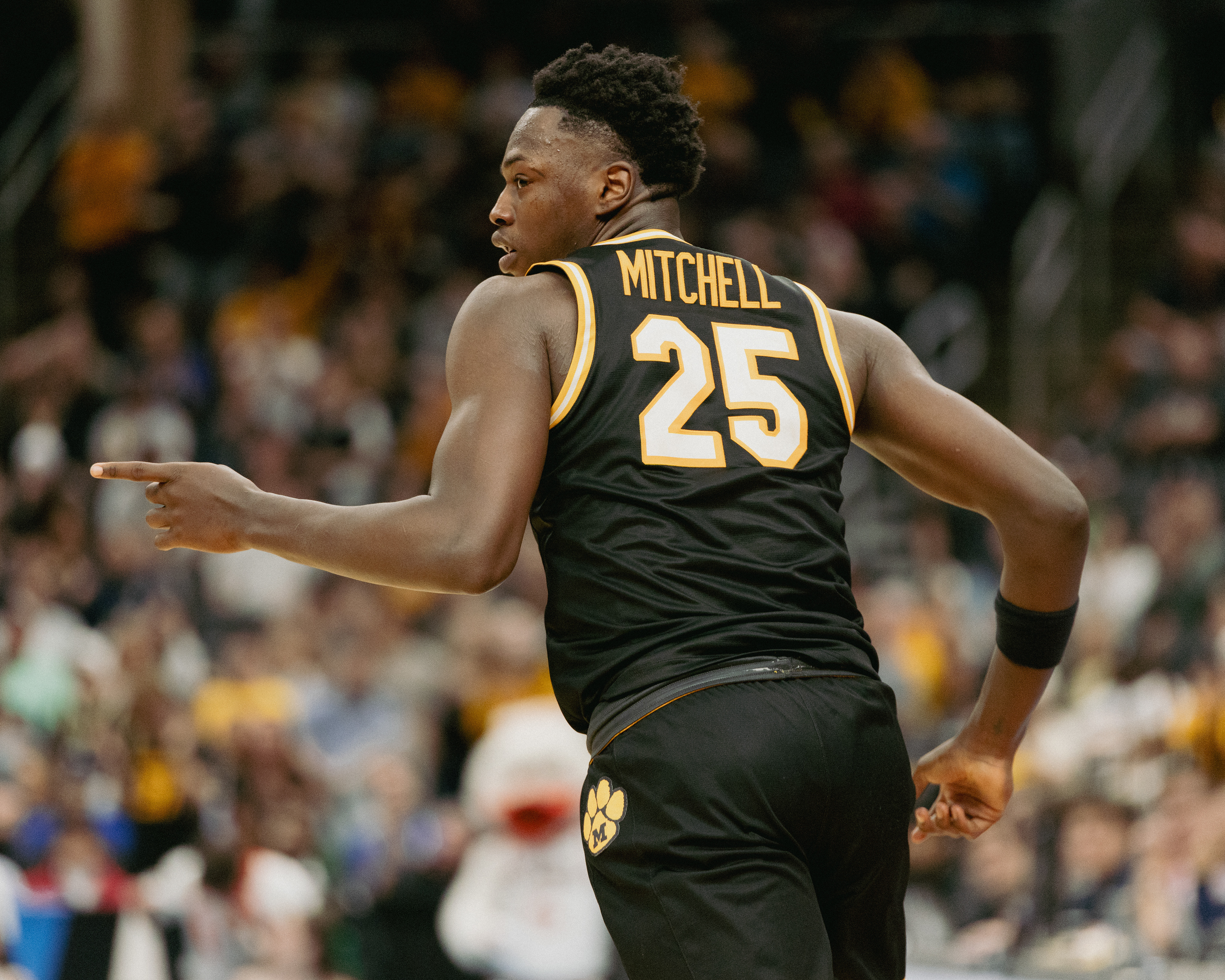 Mizzou forward Mark Mitchell (25) points to his teammate after making a three-point basket the Enterprise Center on March 20, 2026 in Saint Louis, Missouri.