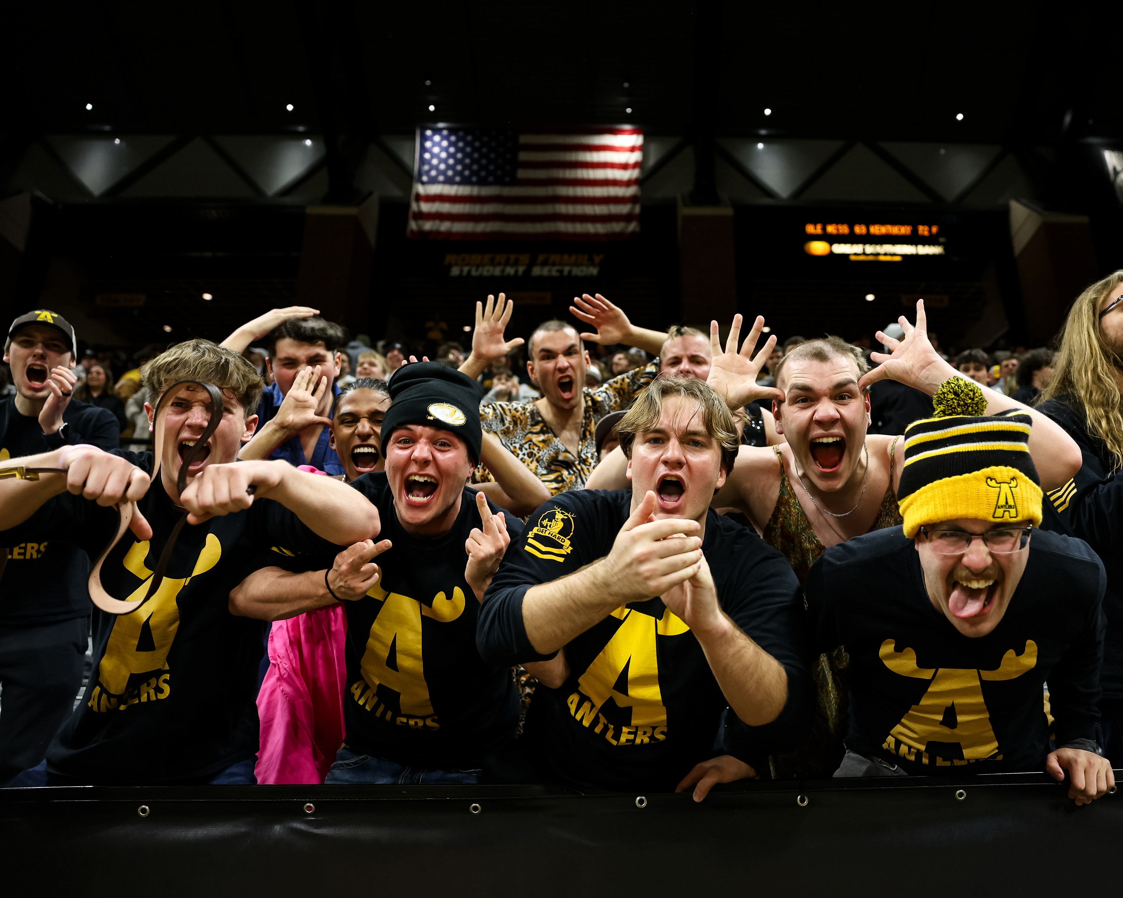 Members of The Antlers a Mizzou Basketball fan club celebrate after Mizzou beat Oklahoma 88-87 in overtime at Mizzou Arena on January 24, 2026 in Columbia, Missouri.
