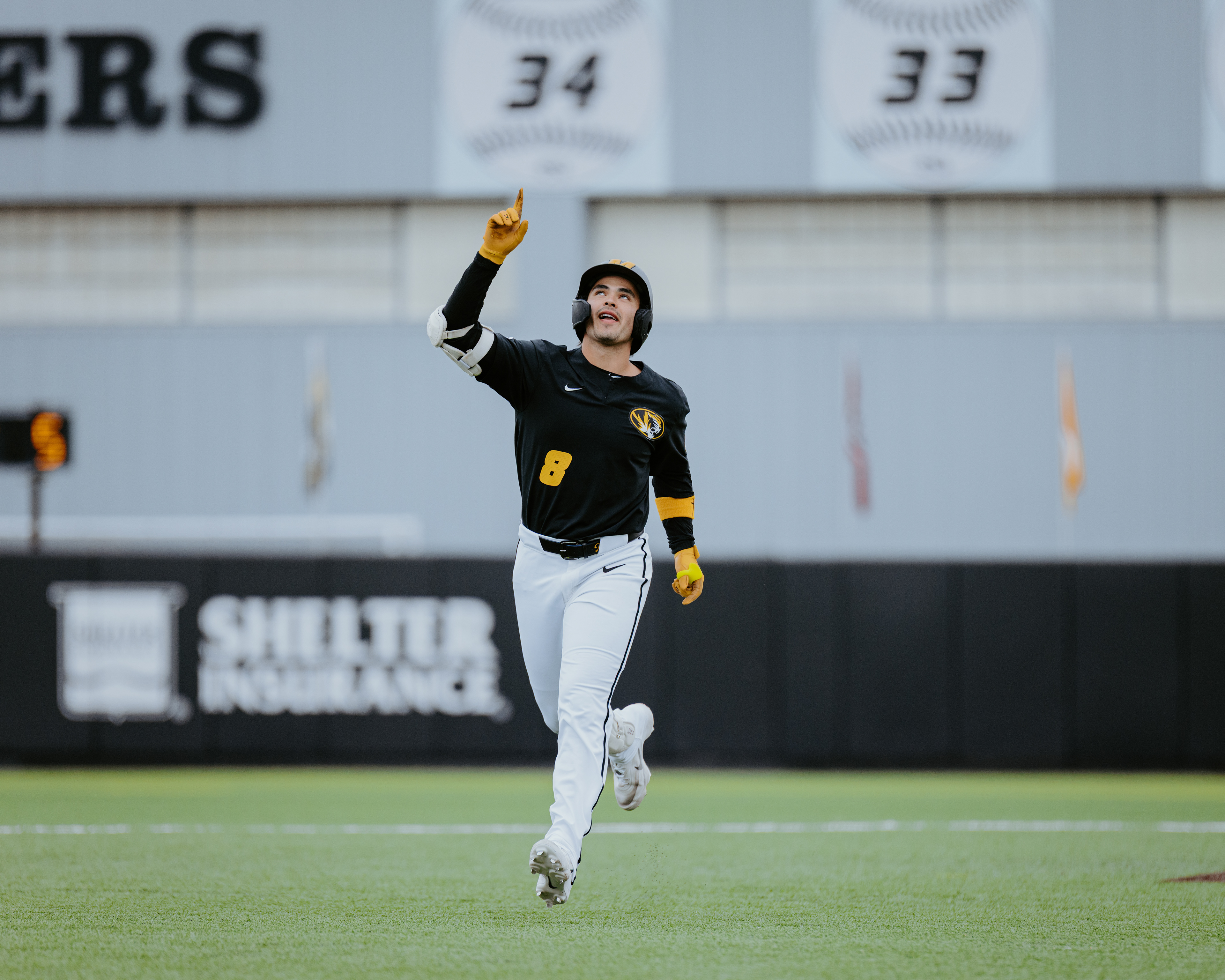 Mateo Serna points to the sky while rounding the bases after hitting a home run at Taylor Stadium on February 25, 2026, in Columbia, Missouri.