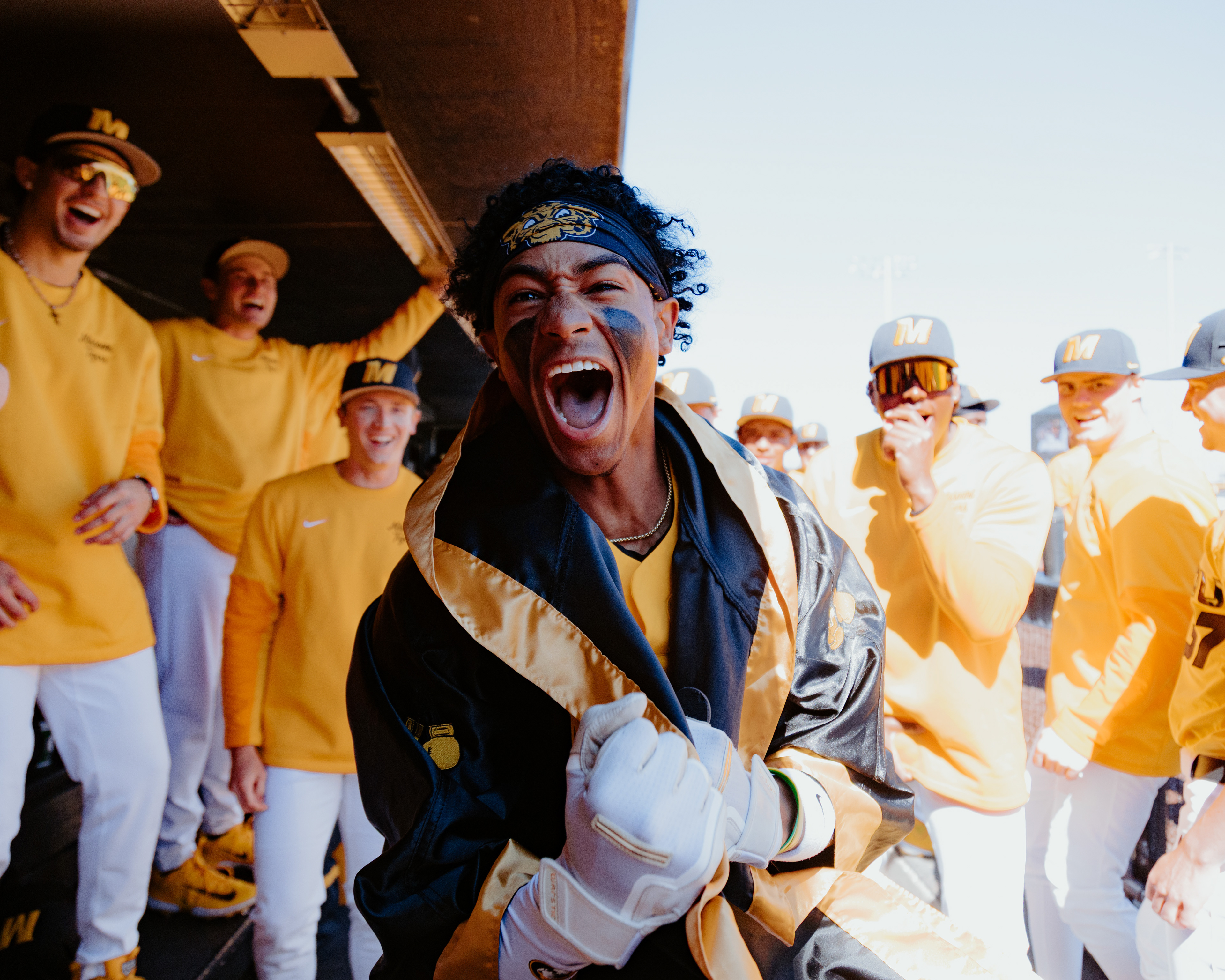 Cameron Benson puts on a Mizzou baseball–themed boxing robe at Taylor Stadium on March 8, 2026, in Columbia, Missouri.