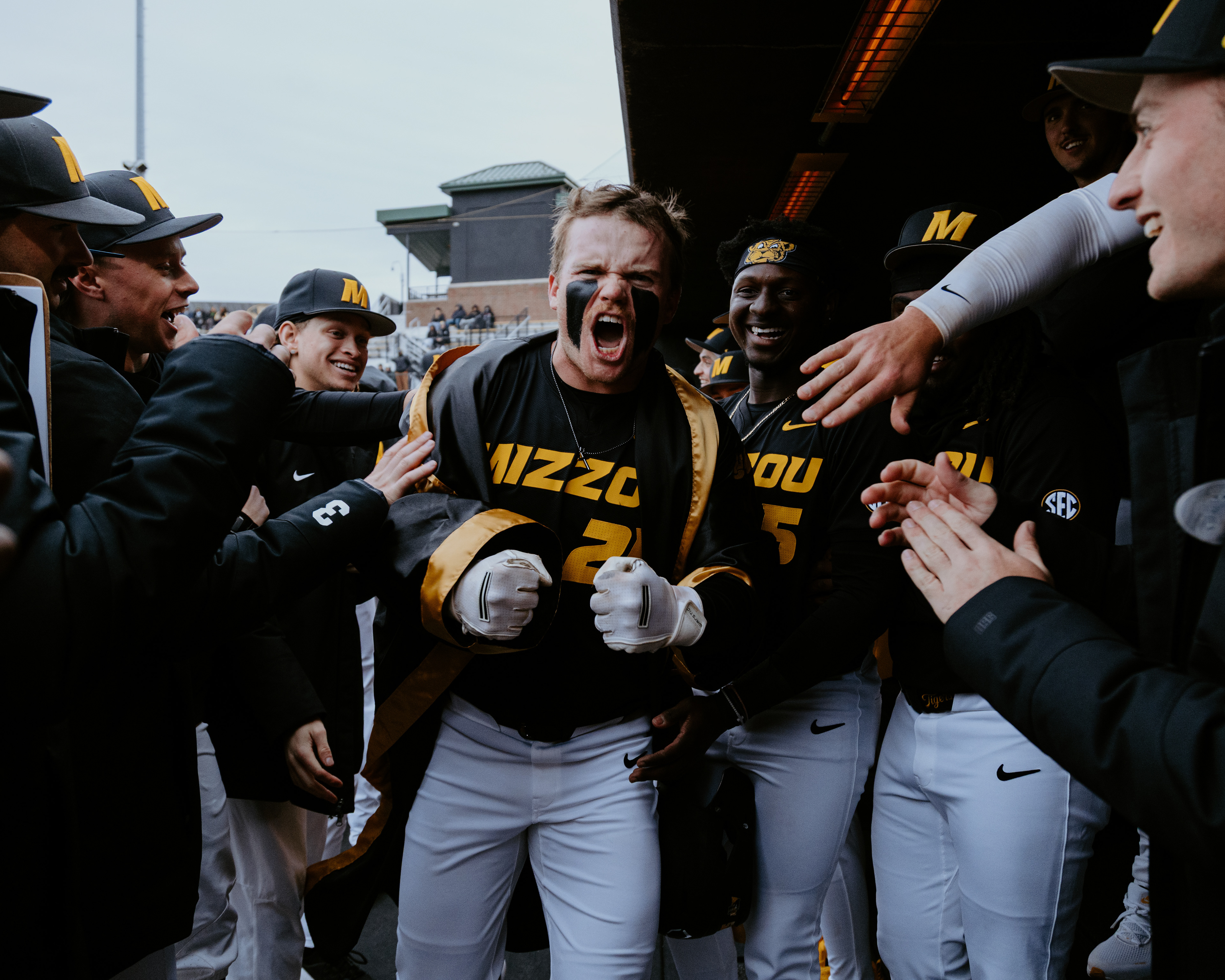 Jase Woita celebrates with his teammates after hitting a home run at Taylor Stadium on February 24, 2026, in Columbia, Missouri.