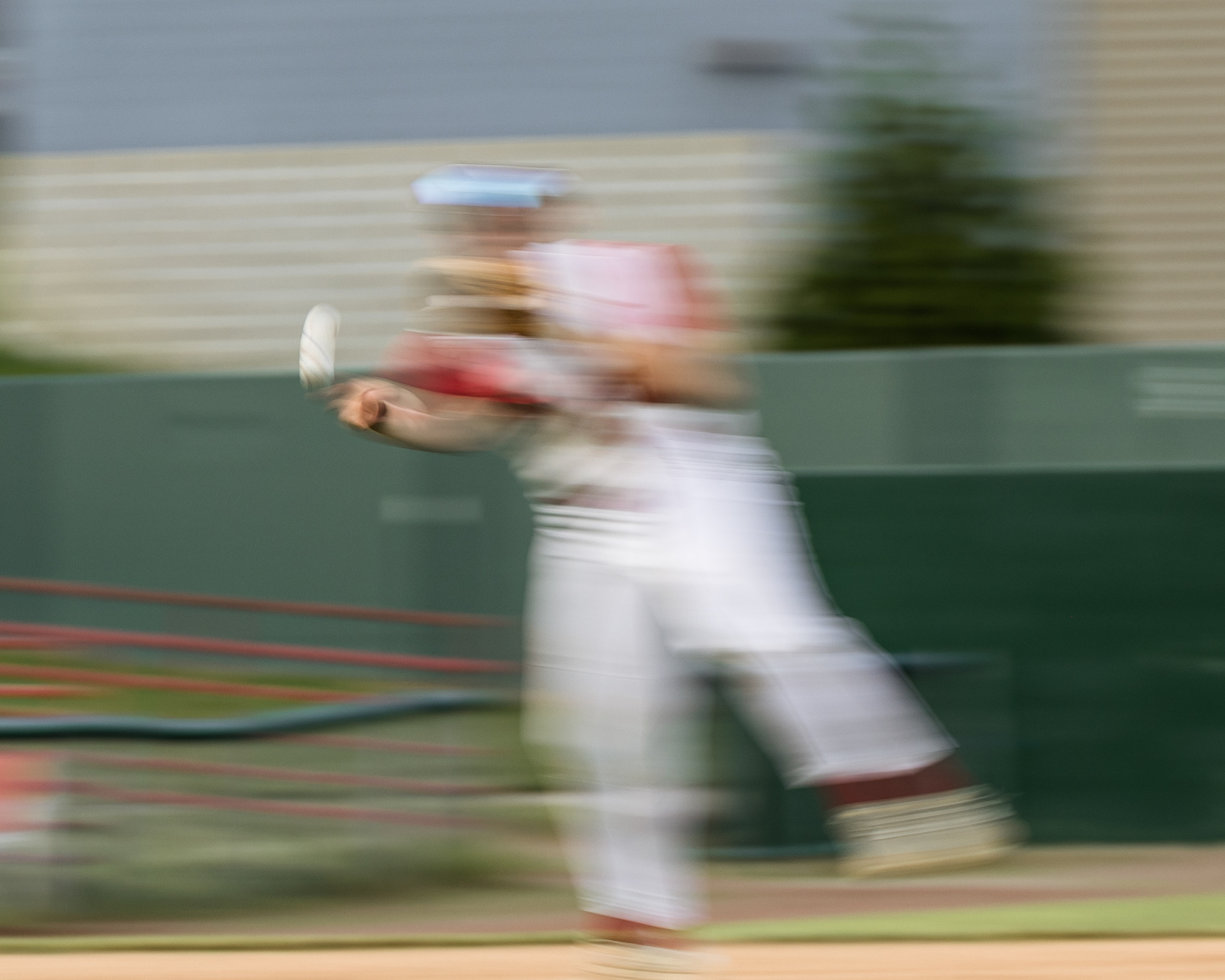 Tyler Gundelfinger fields and throws a ground ball