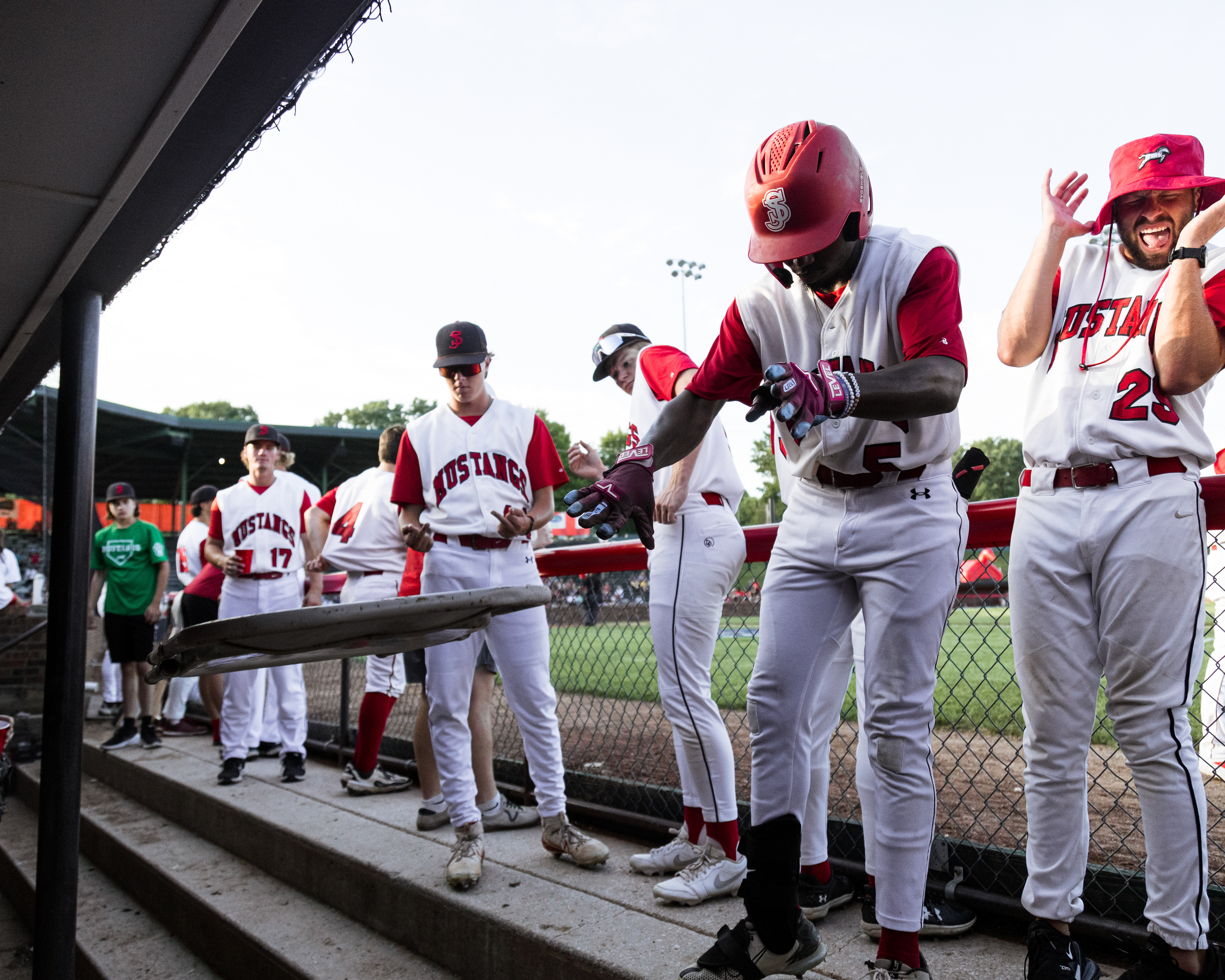 Darius Freeman throws a chair in the dugout to "wake up the bats"