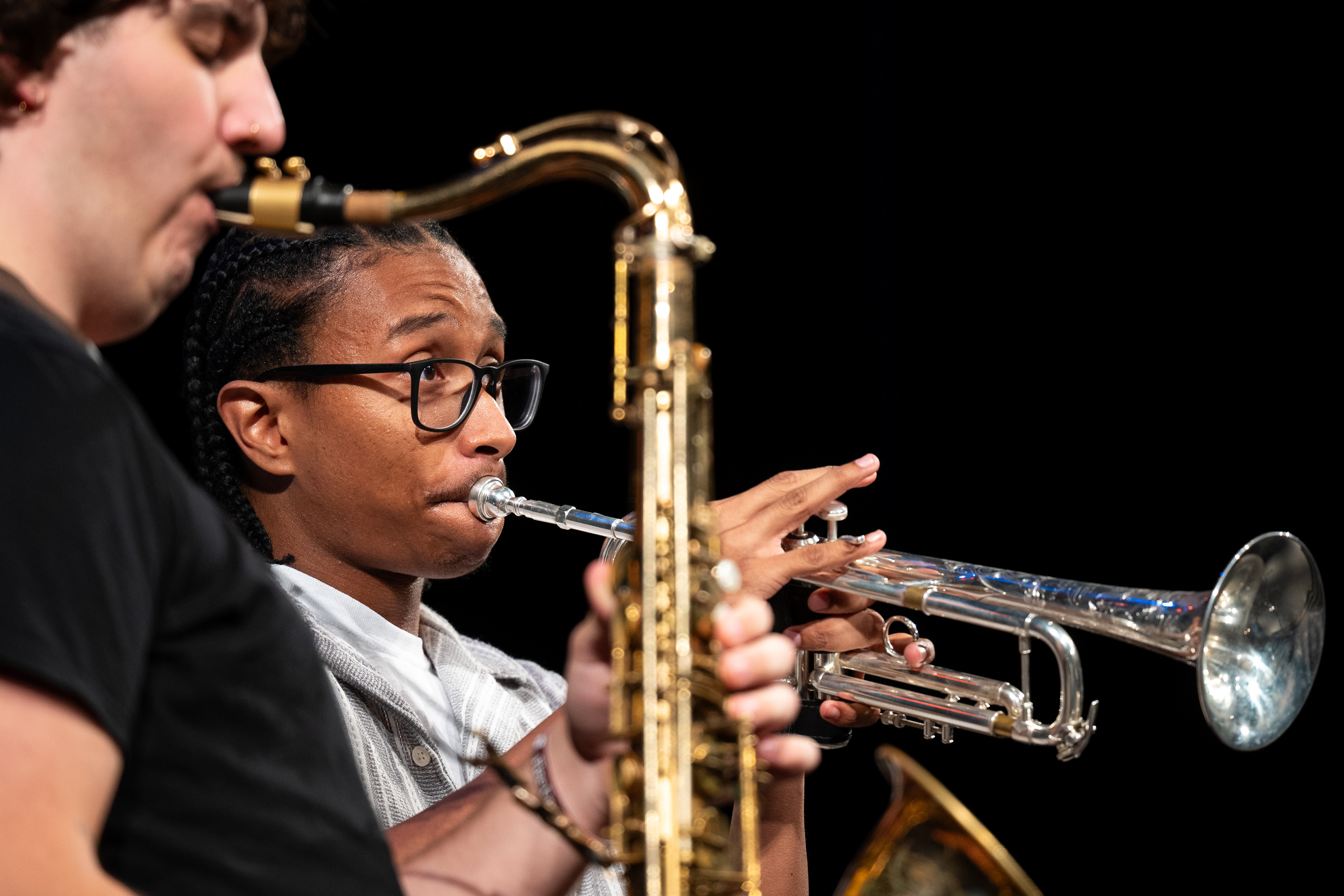 Central Michigan seniors Eric Elmoore, right, and Cohen DeYoung, left, perform in their band during Rock Rally in Plachta Auditorium, Friday, Oct. 24, 2025. Elmoore and his friends began Rock Rally with a few songs.