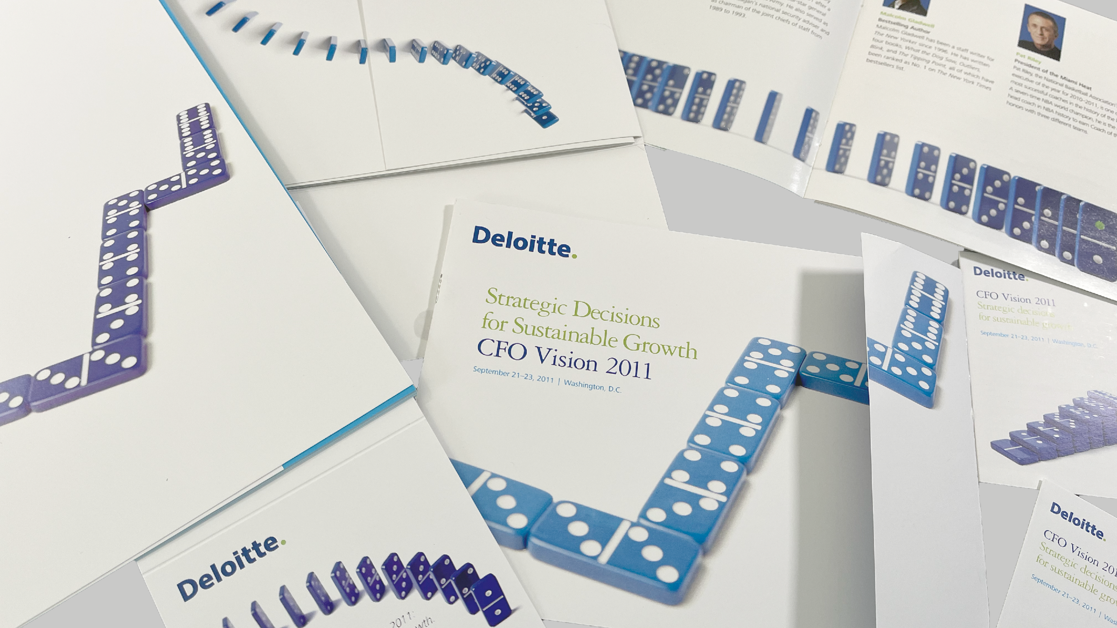 Created the domino theme, art directed photographer, and hand painted a green dot on dominoes that were attached to seal every invitation.