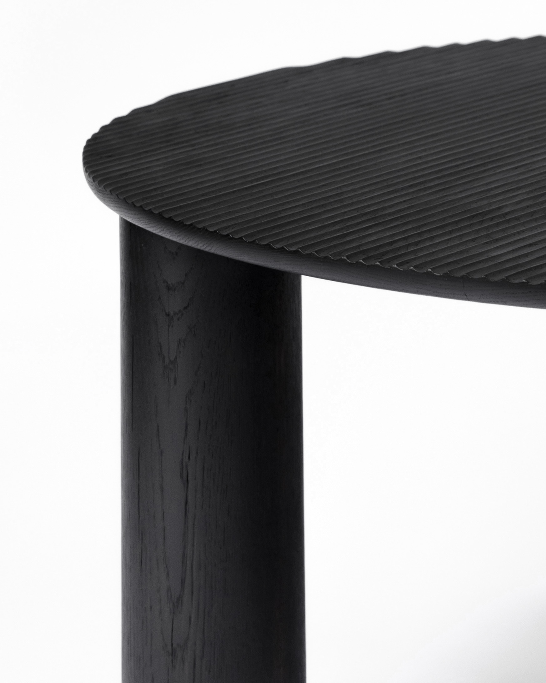 Fluted lounge table in ebonised Scottish oak
