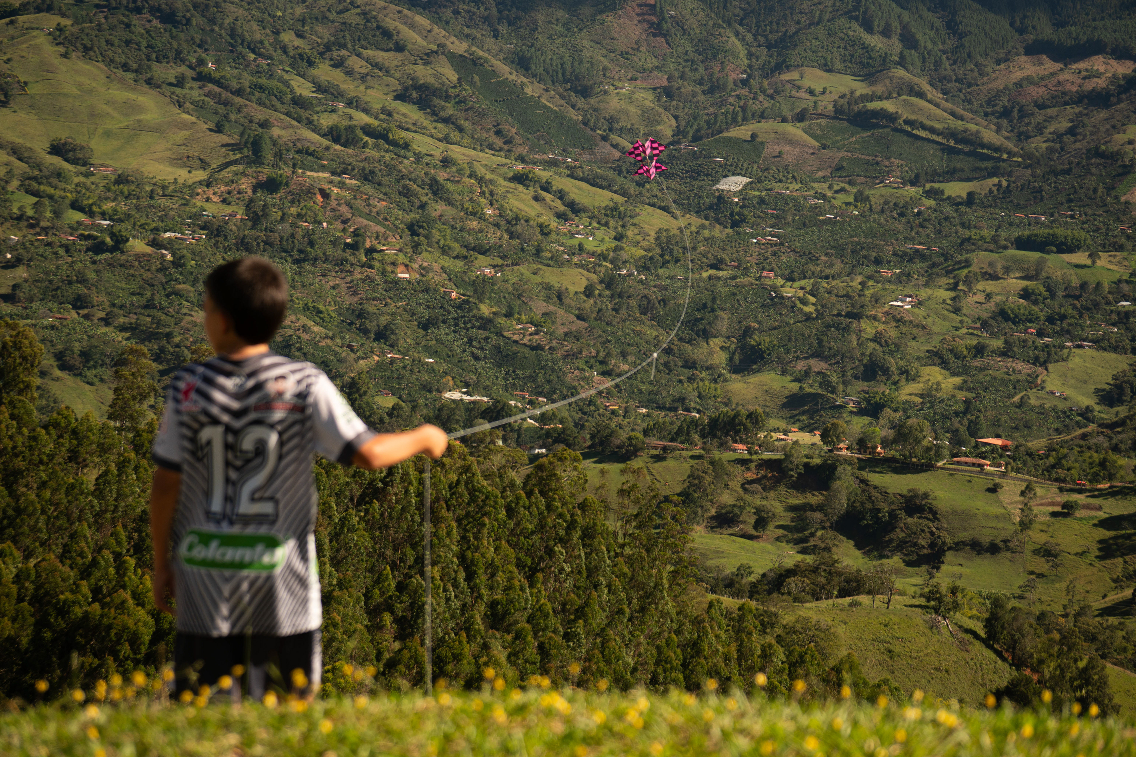 Child flying a kite in Jerico, Colombia.