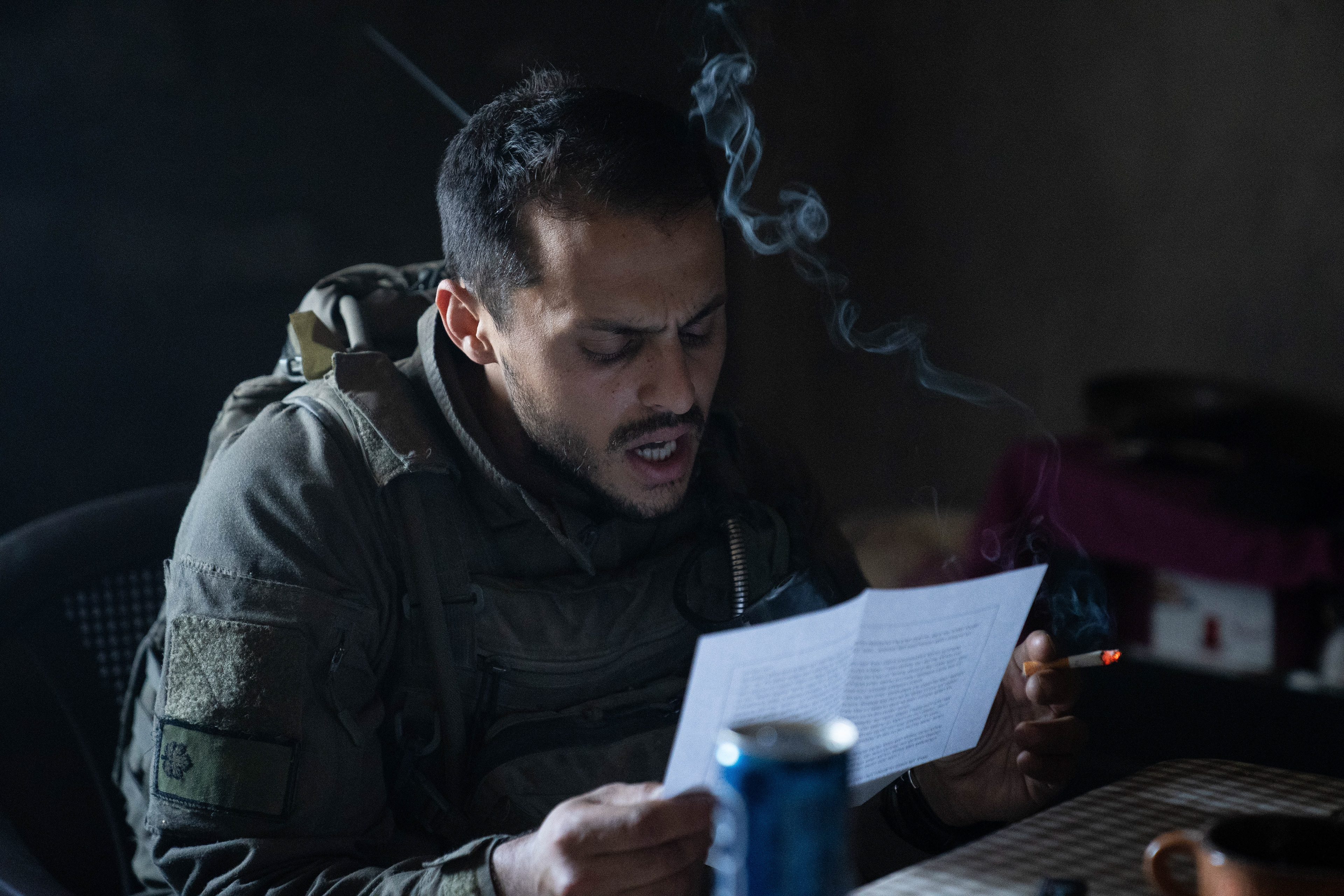 B Company leader leader receives a letter from his wife after several weeks in Gaza.